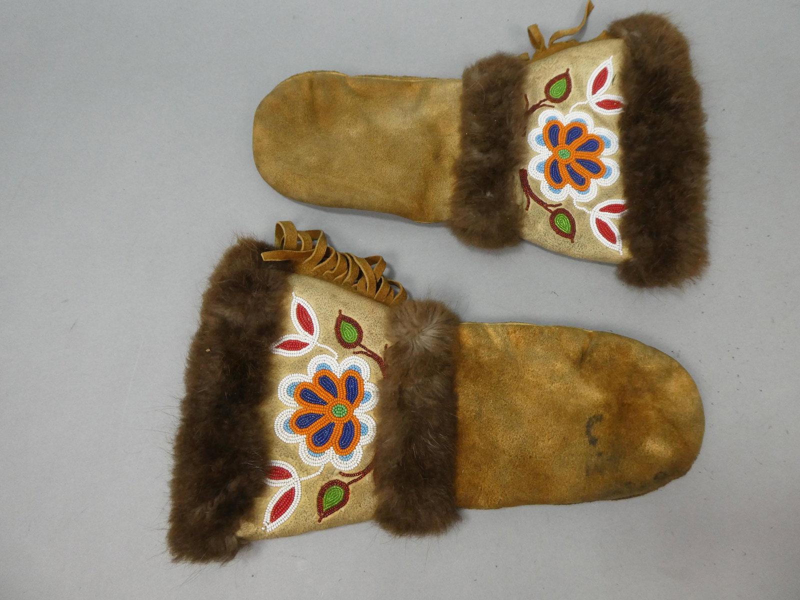 Pair Vintage Western Native American Endian Beaded Mittons: Pair Vintage Western Native American Endian Beaded Mittons. Measurements in inches: 15 long Condition:Has wear and soiling with use Shipping:We offer in-house shipping. Item(s) will be packed after in
