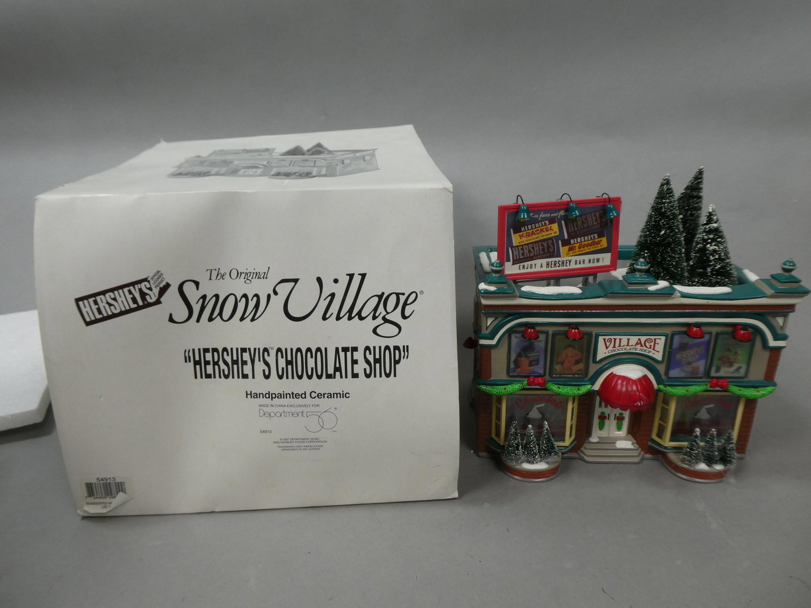 Department 56 Snow Village 1997 Hershey's Chocolate Shop in Box: Department 56 Snow Village 1997 Hershey's Chocolate Shop in Box. Condition:Used, good with no problems Shipping:We offer in-house shipping. Item(s) will be packed after invoice is paid and shipping ch