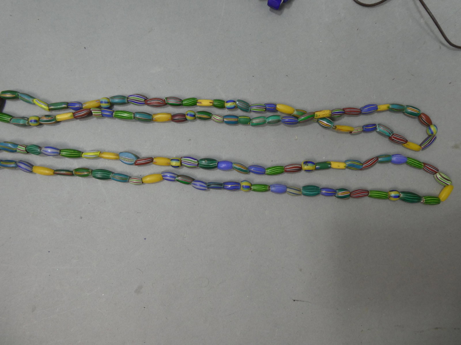 Pair Antique African Trade Venetian Striped Multi-Color Glass Beaded Necklaces: Pair Antique African Trade Venetian Striped Multi-Color Glass Beaded Necklaces. Measurements in inches: 26 long each Condition:Normal wear with age and use Shipping:We offer in-house shipping. Item(s)