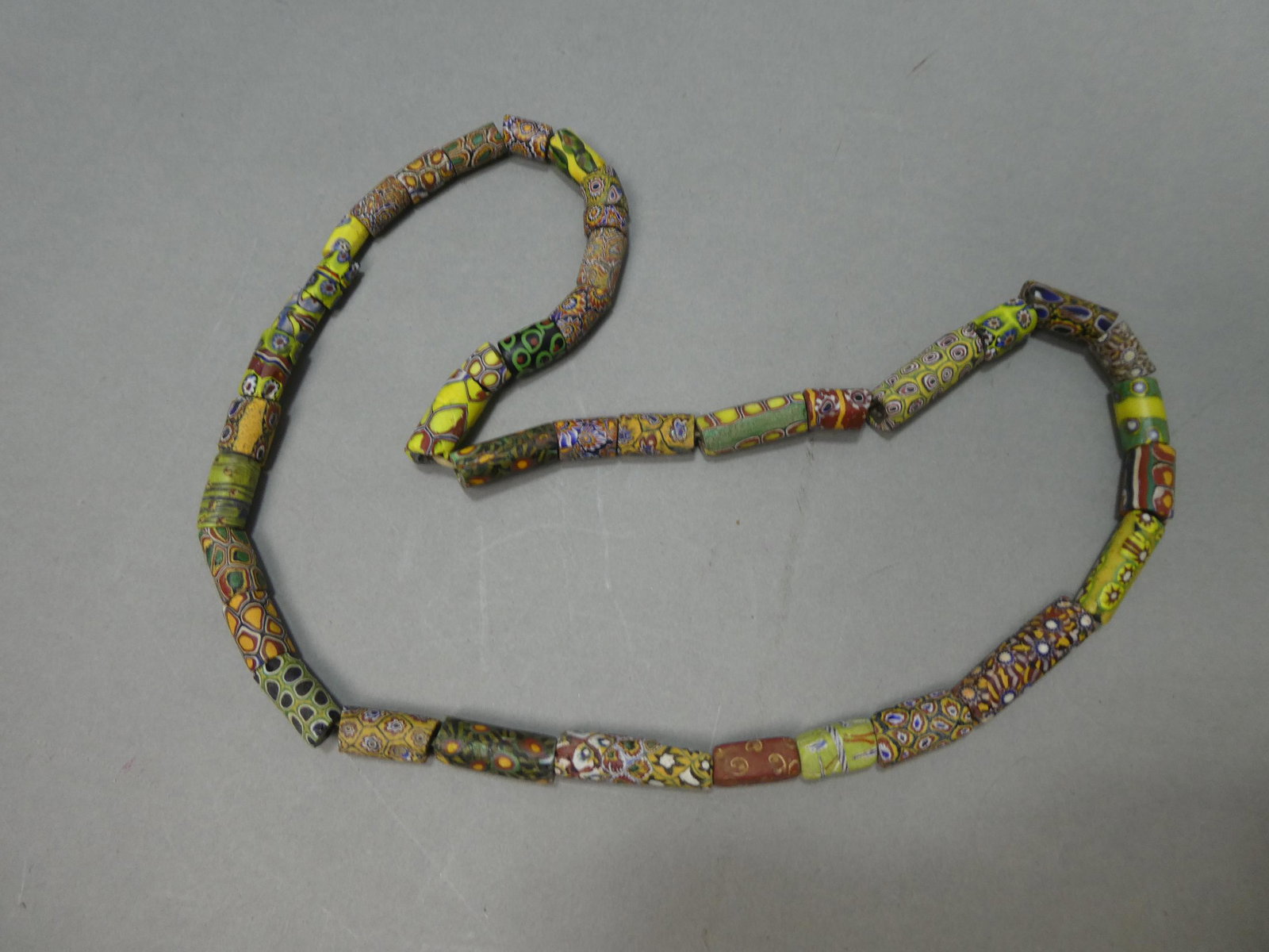 Antique Millefiori Venetian Glass African Trade Large Bead Beaded Necklace: Antique Millefiori Venetian Glass African Trade Large Bead Beaded Necklace. Measurements in inches: 28 long Condition:Normal wear with age and use Shipping:We offer in-house shipping. Item(s) will be 