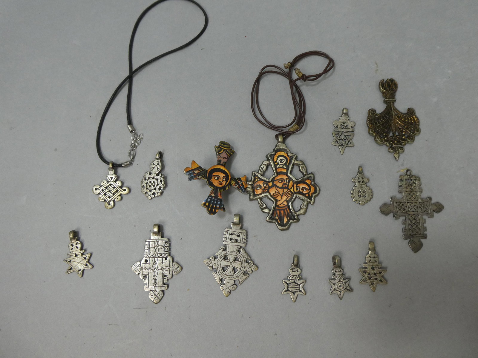 Lot 13 Antique Metal & Brass African Ethiopian Coptic Cross Pendants etc: Lot 13 Antique Metal & Brass African Ethiopian Coptic Cross Pendants etc. Condition:Normal wear with age and use Shipping:We offer in-house shipping. Item(s) will be packed after invoice is paid and s