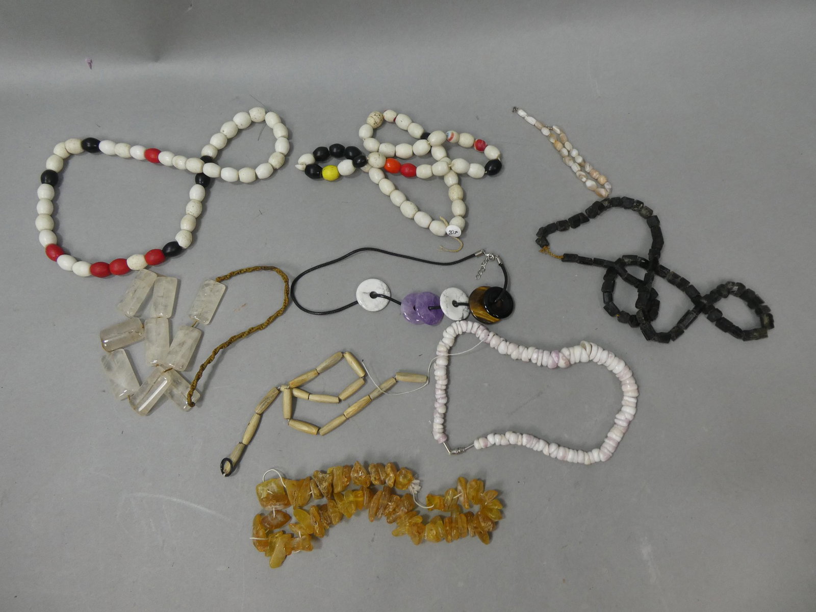 Lot 9 Antique Assorted African Trade Beaded Necklaces: Lot 9 Antique Assorted African Trade Beaded Necklaces. Condition:Normal wear with age and use Shipping:We offer in-house shipping. Item(s) will be packed after invoice is paid and shipping charge will