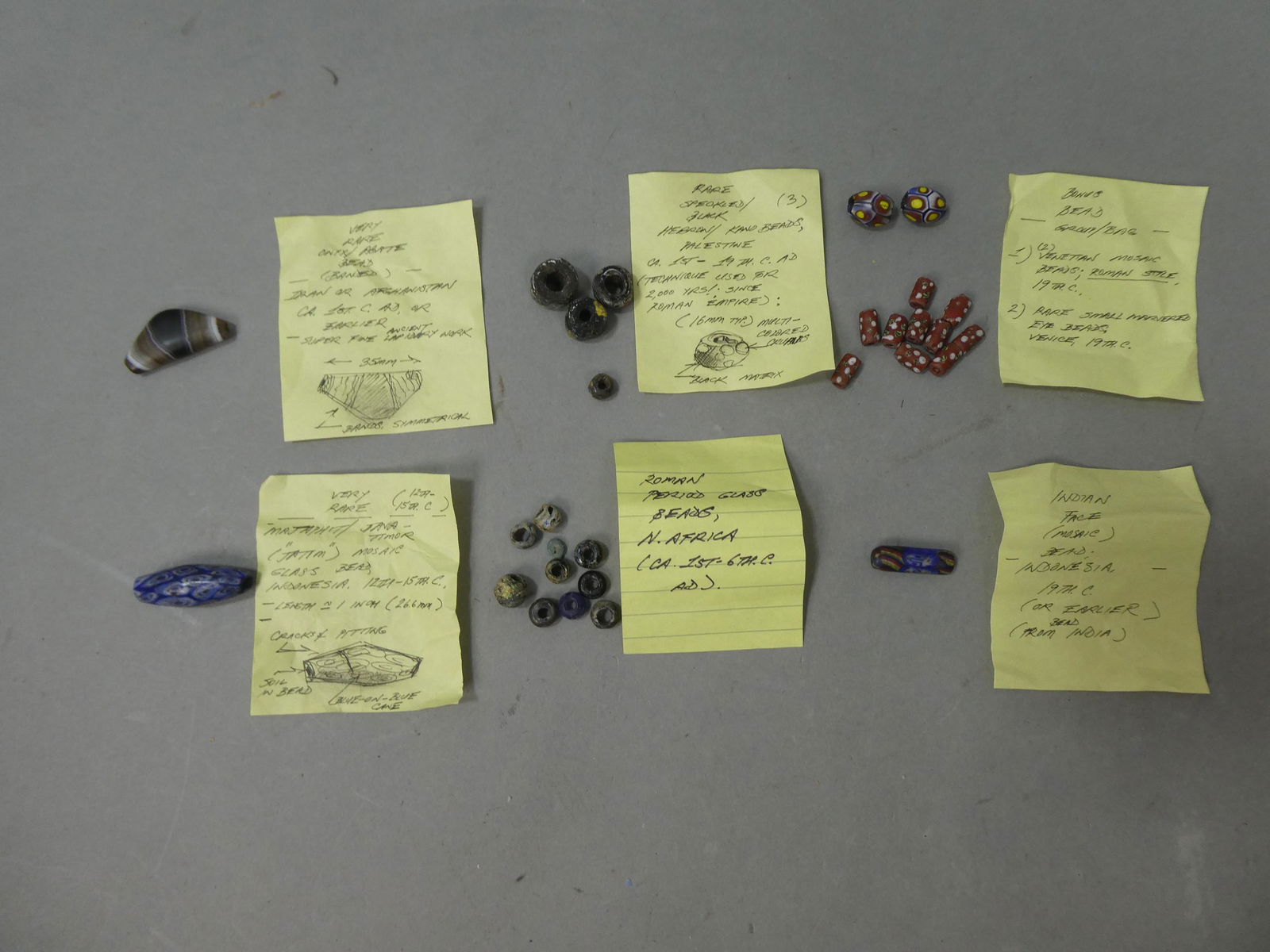 Lot Rare Antique & Neolithic Assorted Beads: Lot Rare Antique & Neolithic Assorted Beads including Indian Mosaic, Roman Period North African glass, Indonesian Millefiori, 19th Century Venetian, Roman Specked Glass and Iran or Afghanistan Agate.