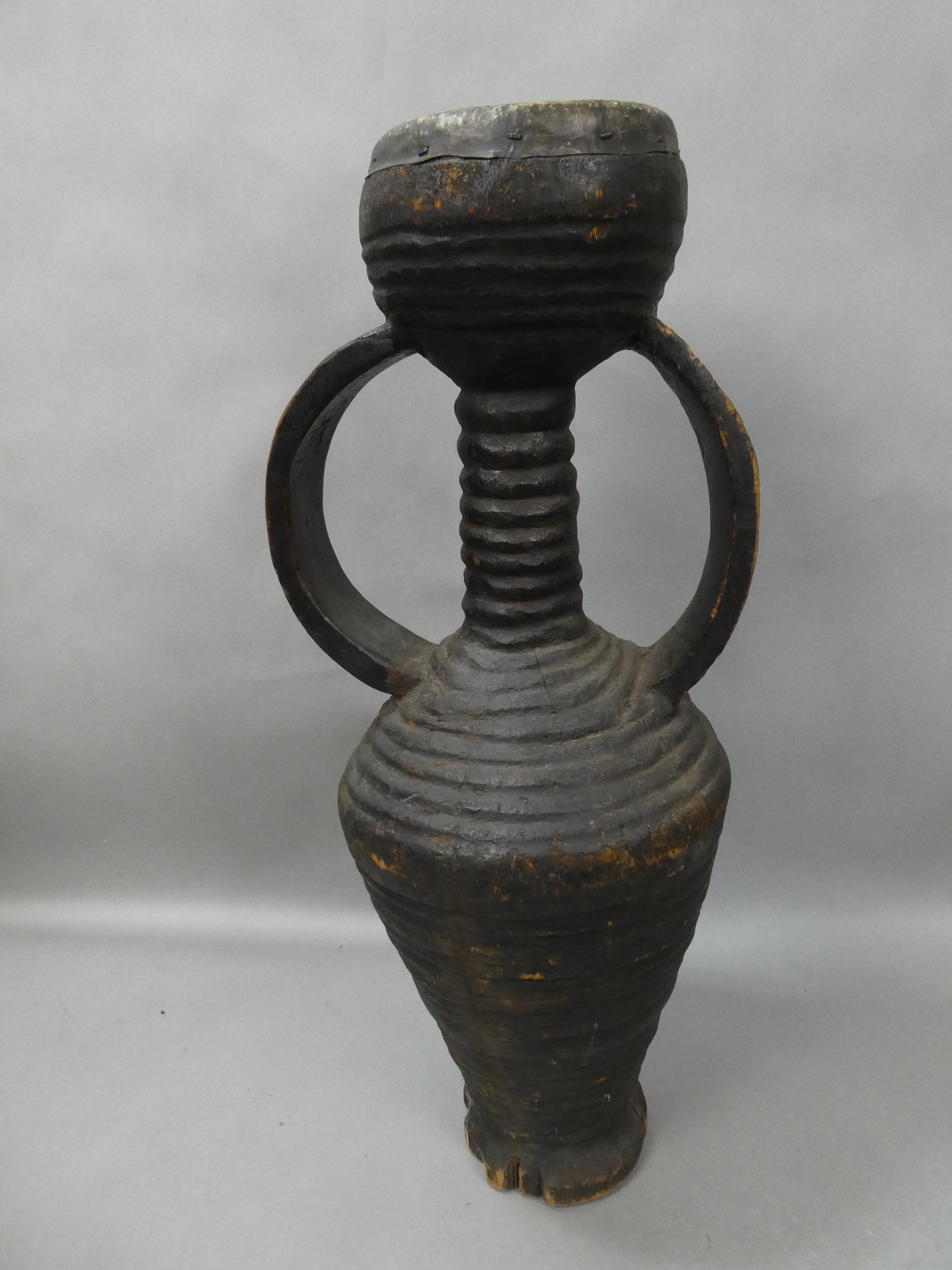 Large Carved Wood African Fluted Tambour Bambala Drum w/ Handles: Large Carved Wood African Fluted Bong Drum w/ Handles. Measurements in inches: 29 high x 12 diameter Condition:Normal wear with age and use Shipping:We offer in-house shipping. Item(s) will be packed 