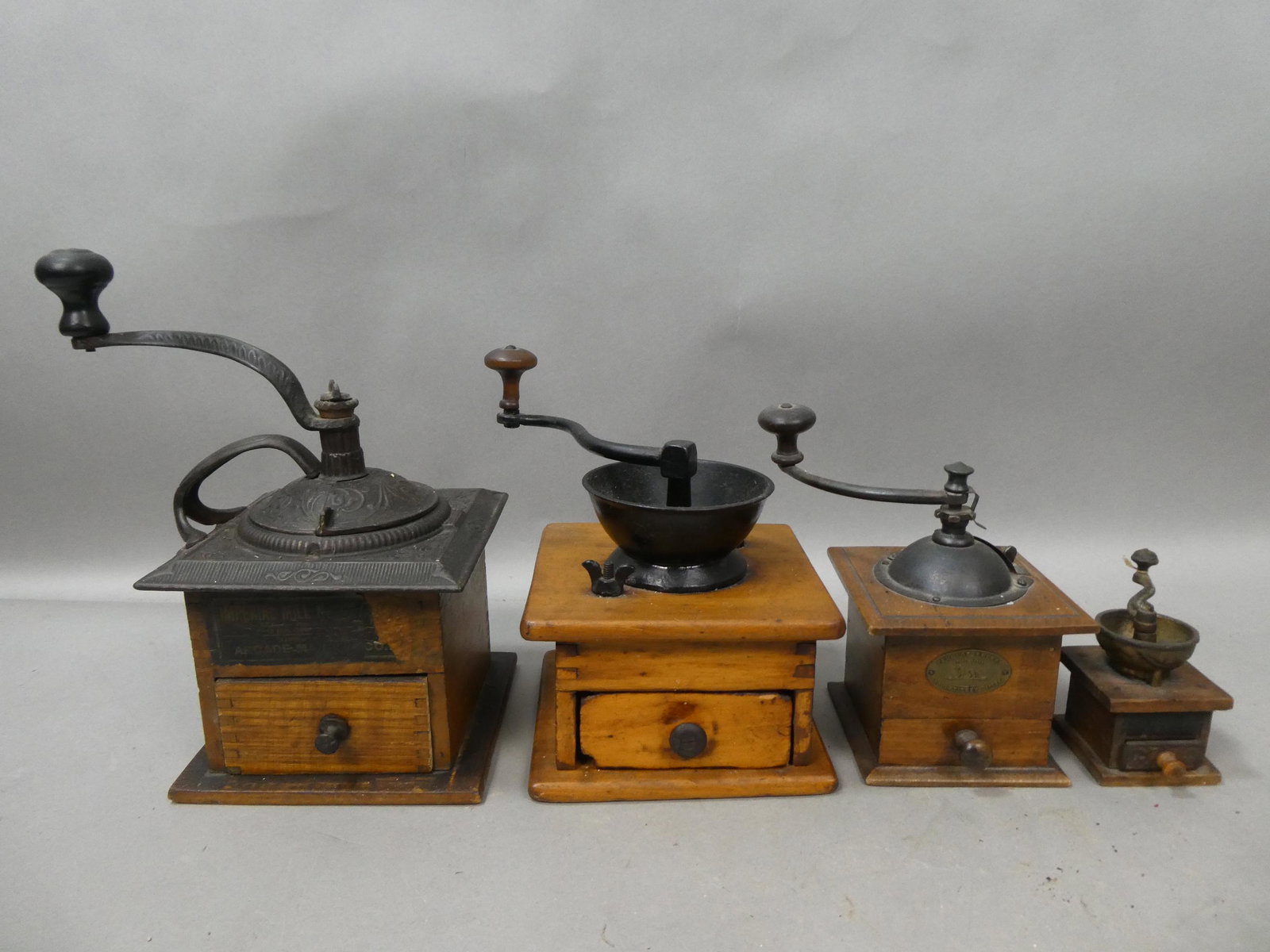 Lot 4 Antique Primitive Assorted Coffee Grinders Peugeot Arcade Imperial etc: Lot 4 Antique Primitive Assorted Coffee Grinders Peugeot Arcade Imperial etc. Condition:Normal wear with age and use Shipping:We offer in-house shipping. Item(s) will be packed after invoice is paid a