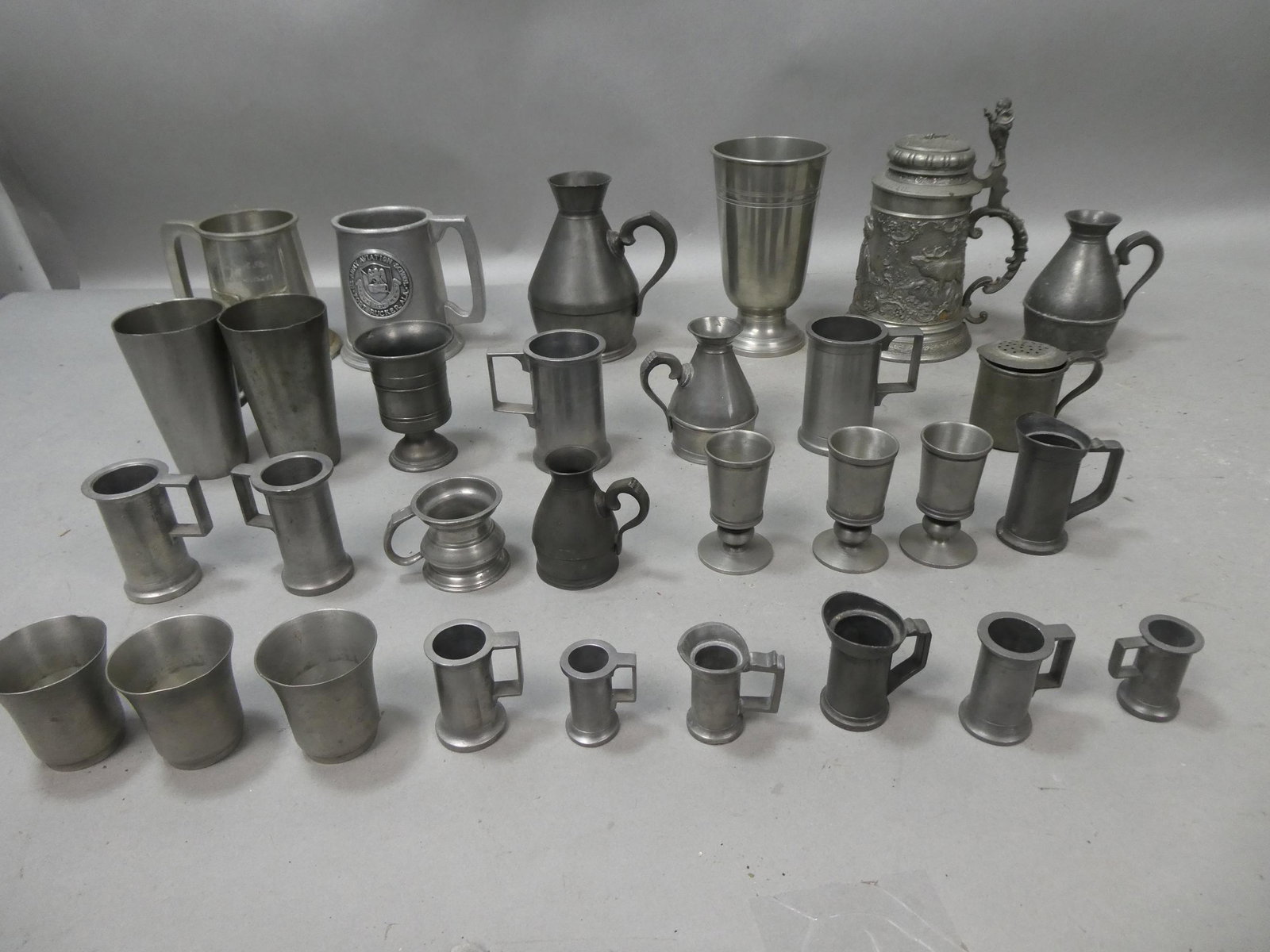 Lot 30 Vintage ^ Antique Pewter Cups Mugs Shots Tankards etc: Lot 30 Vintage & Antique Pewter Cups Mugs Shots Tankards etc. Including Crown Rose, Palliser's, Goutet, Wilton, Raymond and much more. Condition:As found, sold as is Shipping:We offer in-house shippin