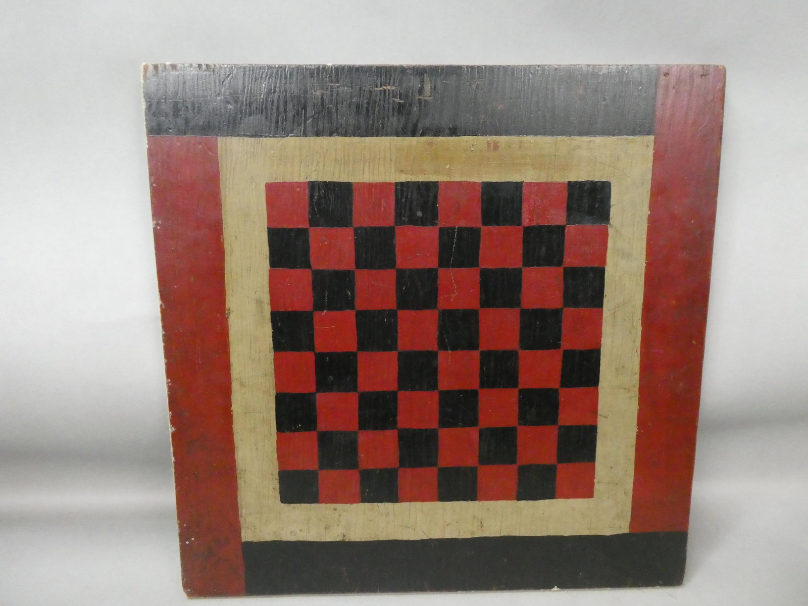 c1940's Folk Art Primitive Hand Painted Double Sided Game Board Checkerboard: c1940's Folk Art Primitive Hand Painted Double Sided Game Board Checkerboard. Measurements in inches: 20 square Condition:Show wear with age and use Shipping:We offer in-house shipping. Item(s) will b