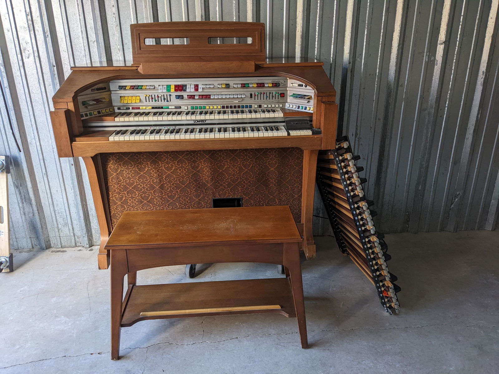 Lowery Celebration Organ W/ Magic Genie: Lowery Celebration Organ W/ Magic Genie With foot pedal and stool.. Condition:In good working condition Shipping:We offer in-house shipping. Item(s) will be packed after invoice is paid and shipping c