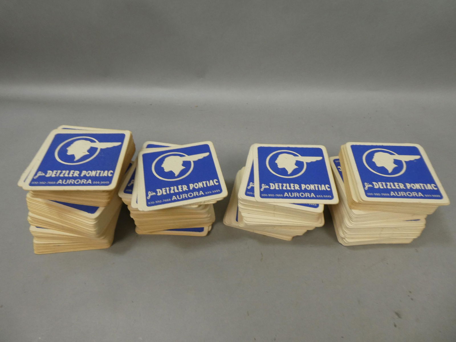 Large Lot NOS Jim Detzler Aurora IL Pontiac Advertising Coasters (1 of 3)