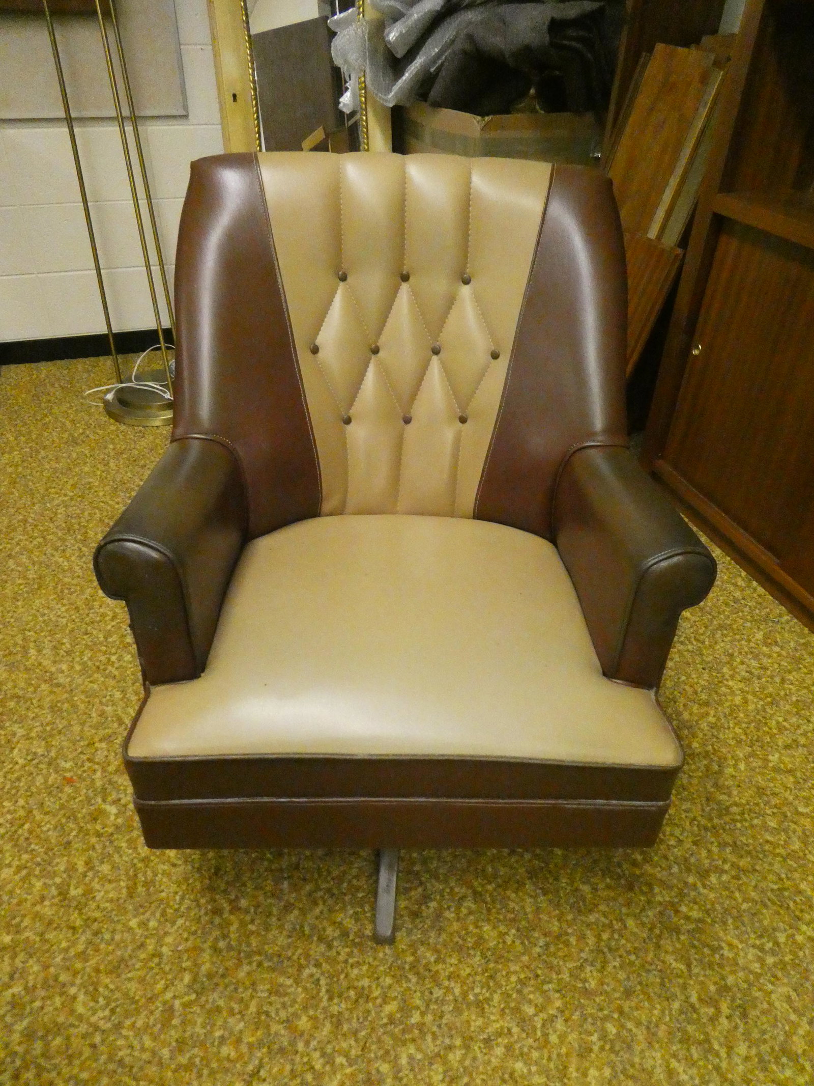 Mid-Century Modern American Naugahyde Swivel Rocker Chair: Mid-Century Modern American Naugahyde Swivel Rocker Chair. Buyer to arrange pick up or delivery from Two Rivers Wisconsin. Many buyers uship.com to find a shipper.. Measurements in inches: 33 high x 2