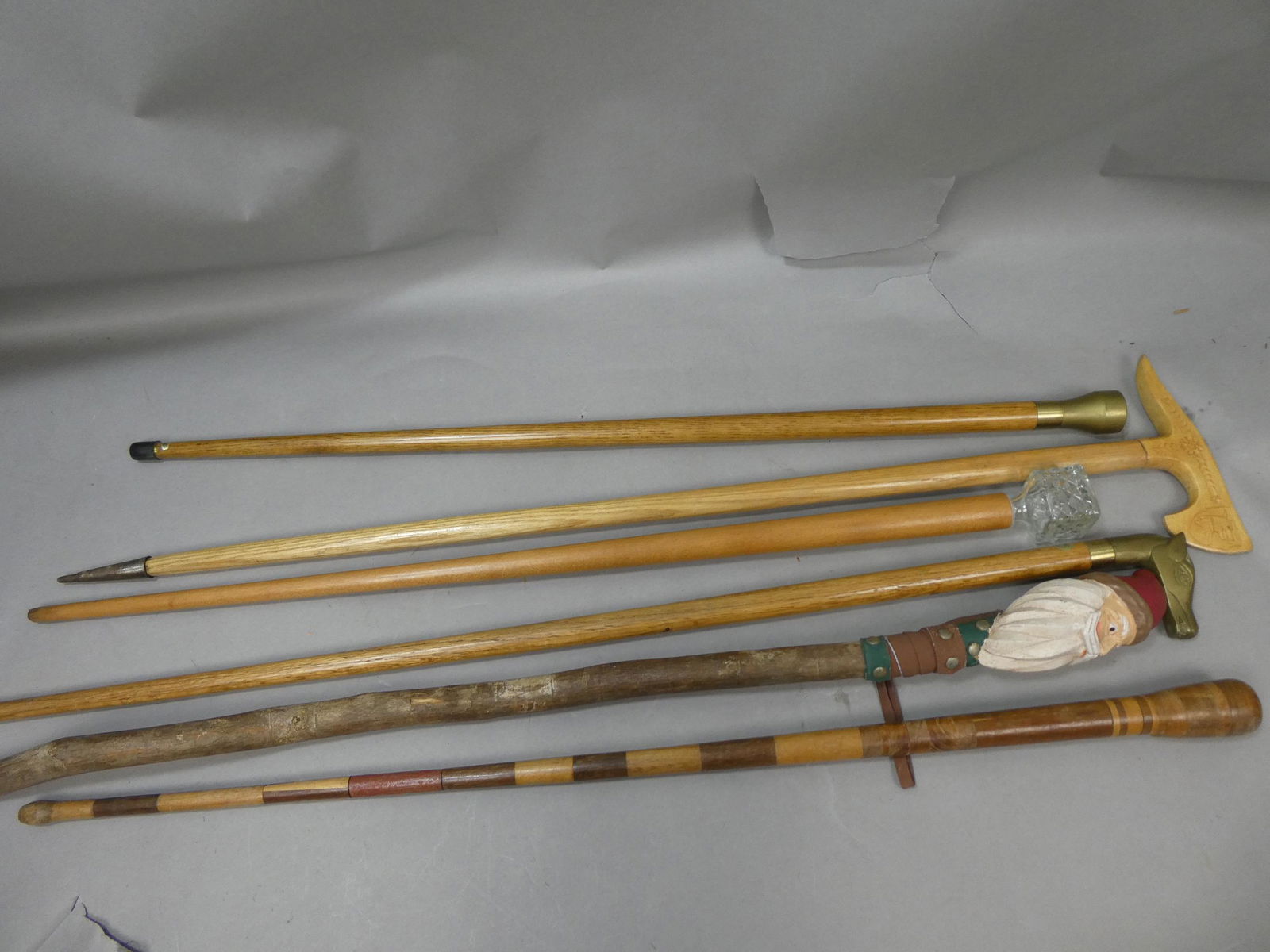 Lot 6 Assorted Walking Stick Canes Carved Santa Brass Horse Compass etc (1 of 10)