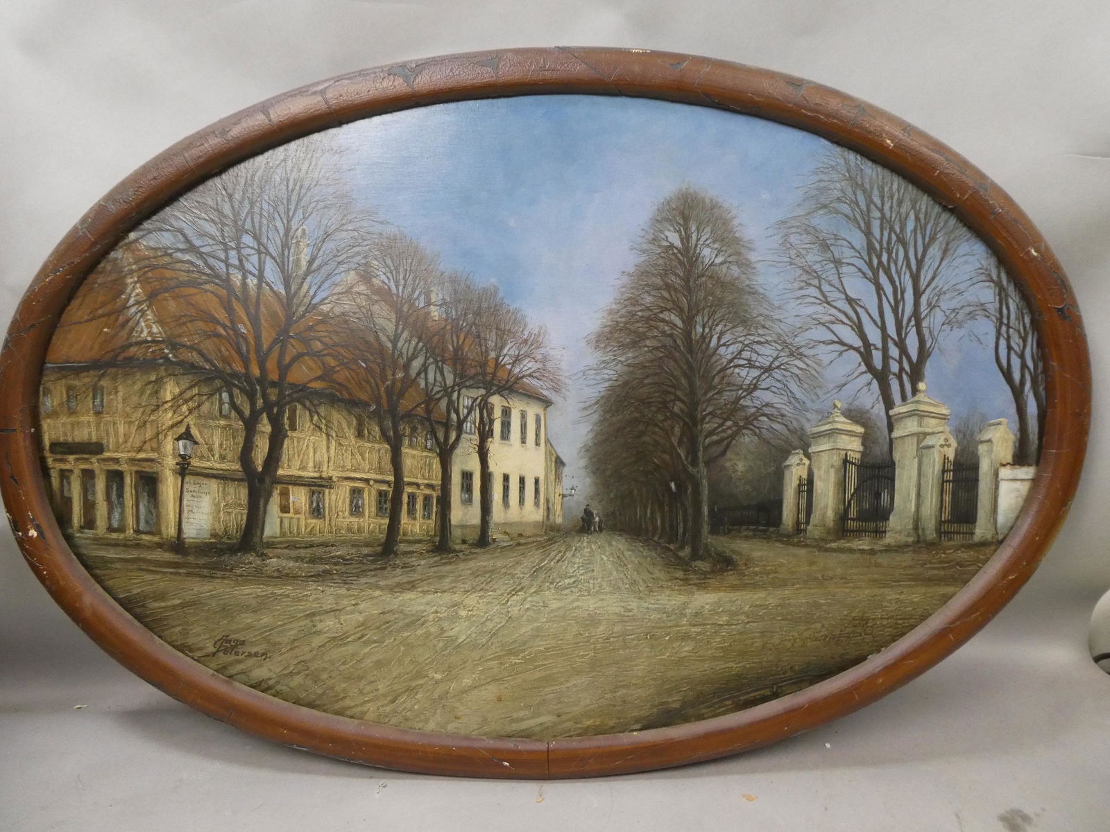 Emanuel Aage Petersen Dutch Street Scene Oval Oil Painting: Emanuel Aage Petersen Dutch Street Scene Oval Oil Painting on board in frame. Signed lower left. Listed Dutch artist born 1894-1948. Measurements in inches: 36 1/2 x 24 1/2, image: 33 1/2 x 21 1/2 Con