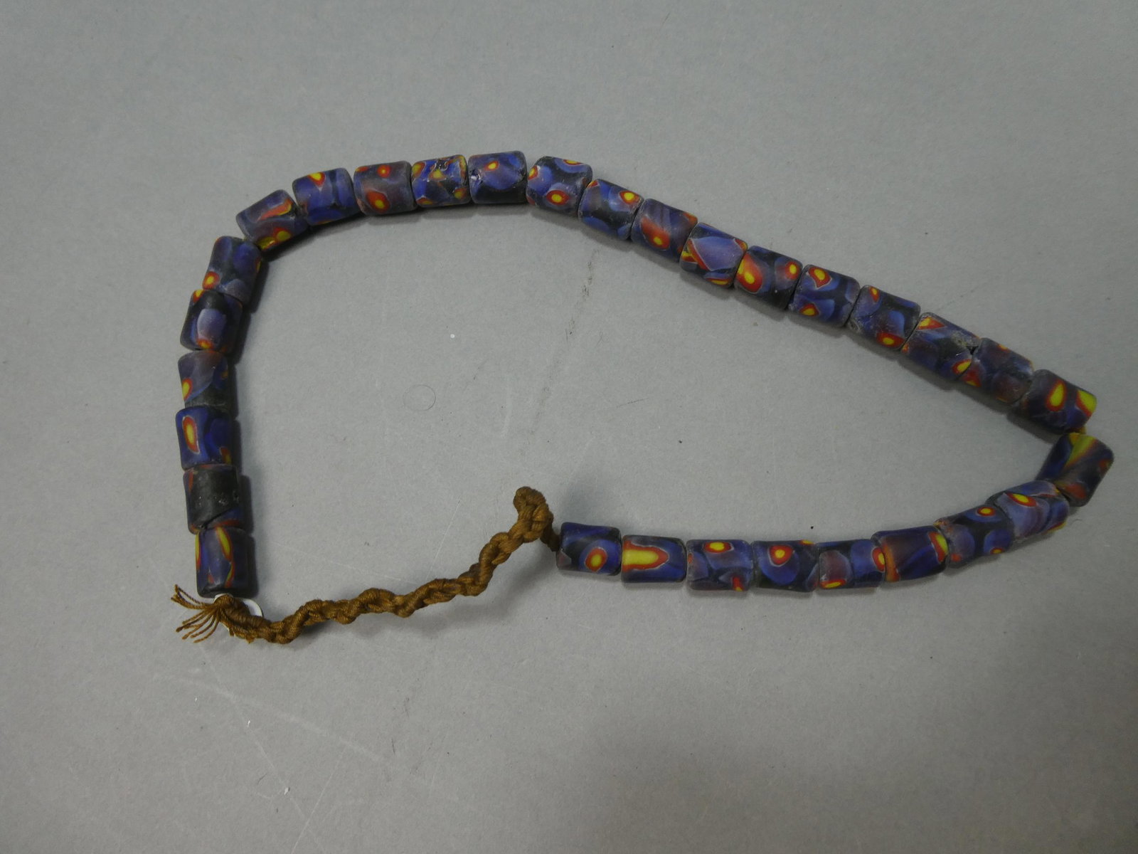 Antique African Trade Venetian Glass Blue Red & Yellow Beaded Necklace: Antique African Trade Venetian Glass Blue Red & Yellow Beaded Necklace. Measurements in inches: 23 long Condition:Normal wear with age and use Shipping:We offer in-house shipping. Item(s) will be pack
