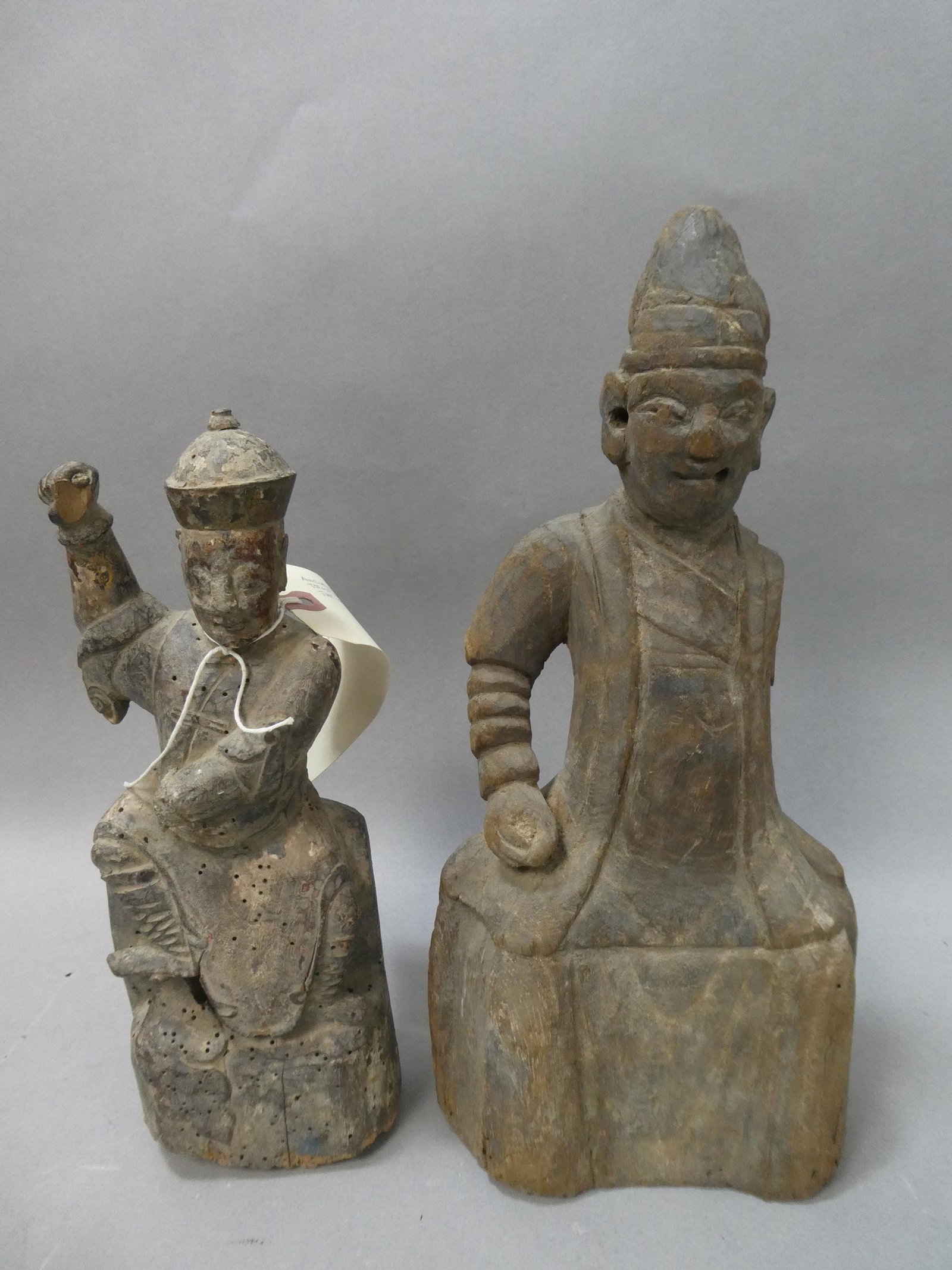 Lot 2 Repro Ancient Asian Carved Wood Temple Warriors: Lot 2 Repro Ancient Asian Carved Wood Temple Warriors. Measurements in inches: 11 and 14 high Condition:Not original, made to look old Shipping:We offer in-house shipping. Item(s) will be packed after