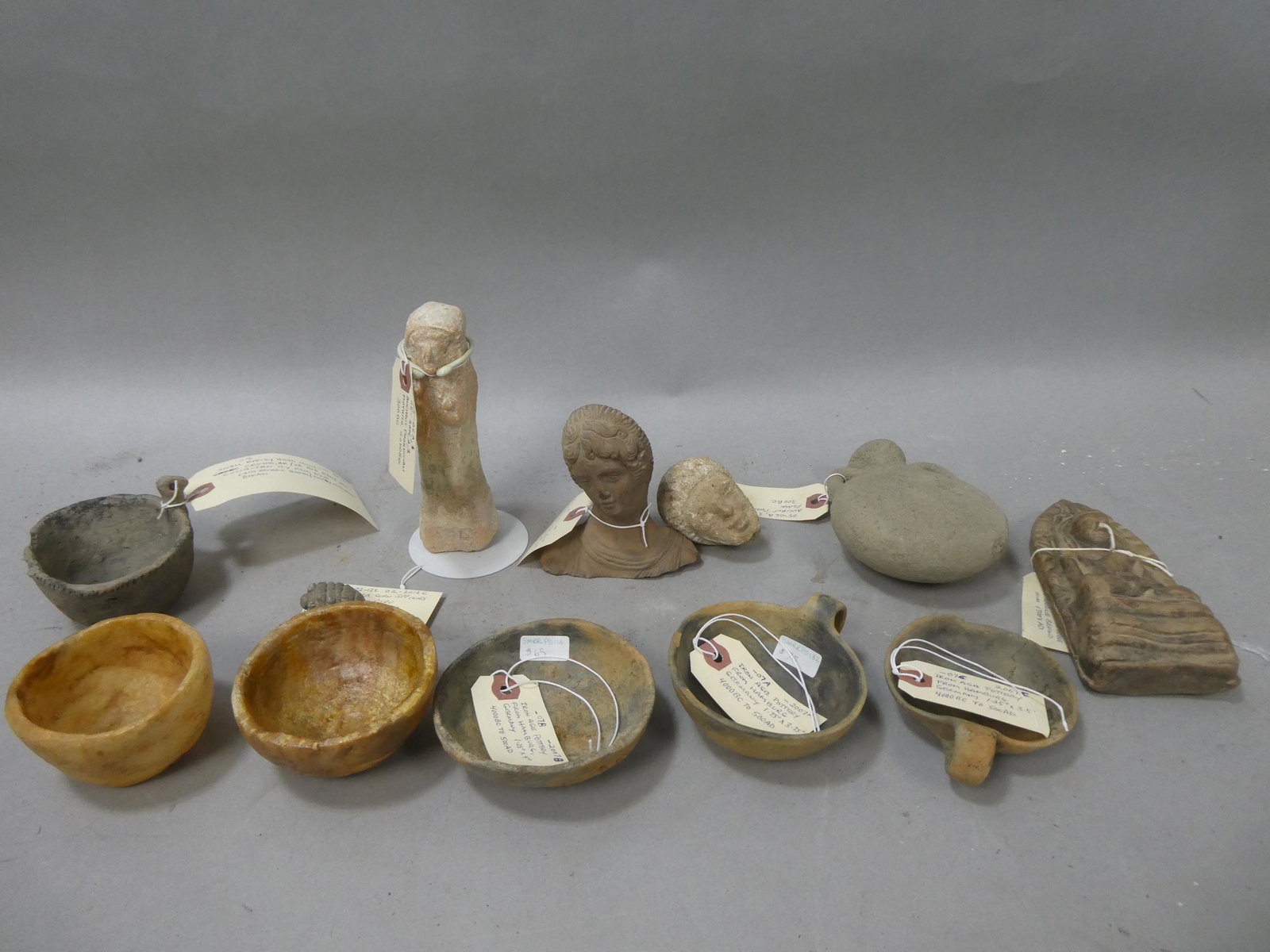 Lot 12 Repro Ancient Artifacts Iron age Thai Phoenician Inca Roman etc: Lot 12 Repro Ancient Artifacts Iron age Thai Phoenician Inca Roman etc. Condition:Not original, made to look old Shipping:We offer in-house shipping. Item(s) will be packed after invoice is paid and s