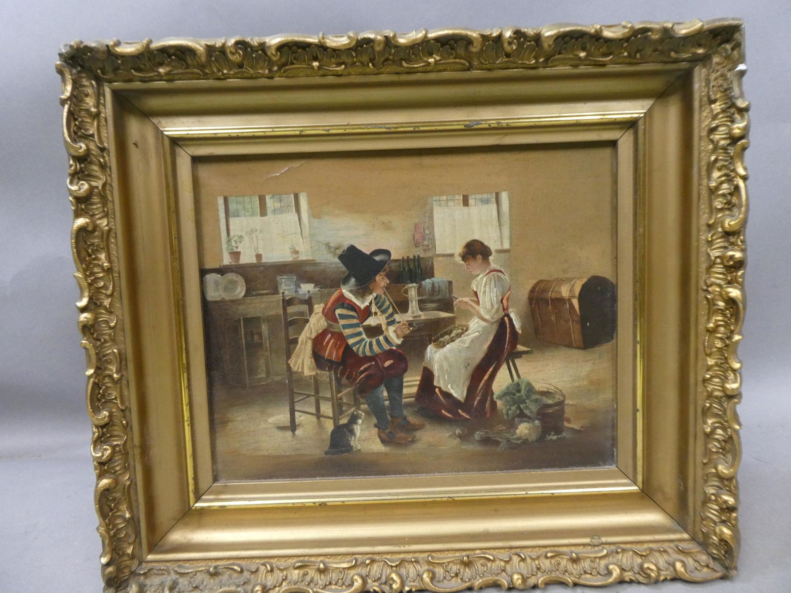 Antique Unsigned Painting On Tin Dutch Man Woman & Cat: Antique Unsigned Painting On Tin Dutch Man Woman & Cat in frame. Measurements in inches: 14 x 12, image: 9 3/4 x 7 1/2 Condition:Has some in-painting along edges and cracks in paint. Frame has chippin