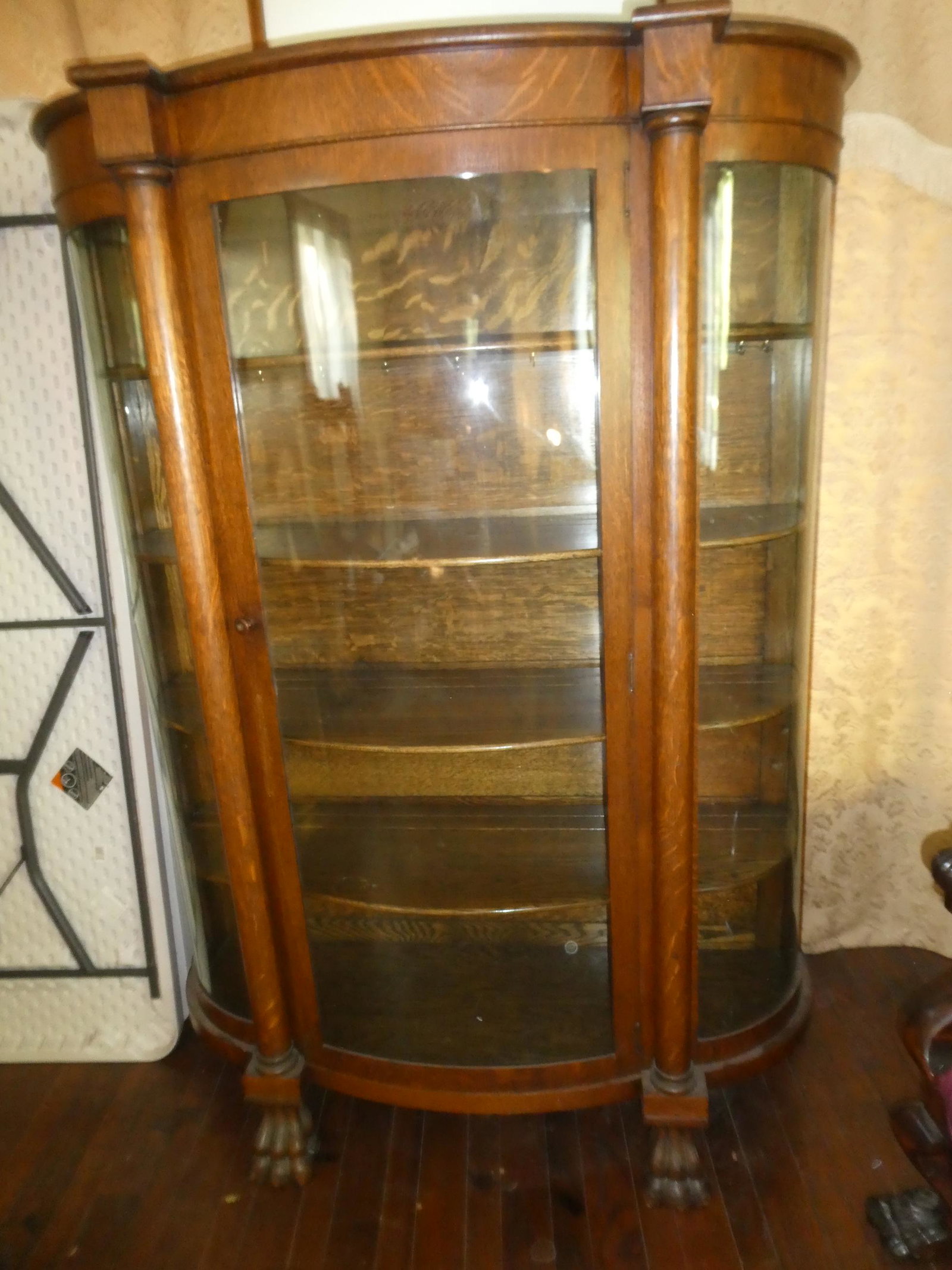 Antique Original Oak Wood Curved Glass China Cabinet w/ Claw Feet: Antique Original Oak Wood Curved Glass China Cabinet w/ Claw Feet. From a private estate in Waukegan, IL buyer to arrange pick up or shipping.. Measurements in inches: 68 high x 48 x 17 Condition:Nice