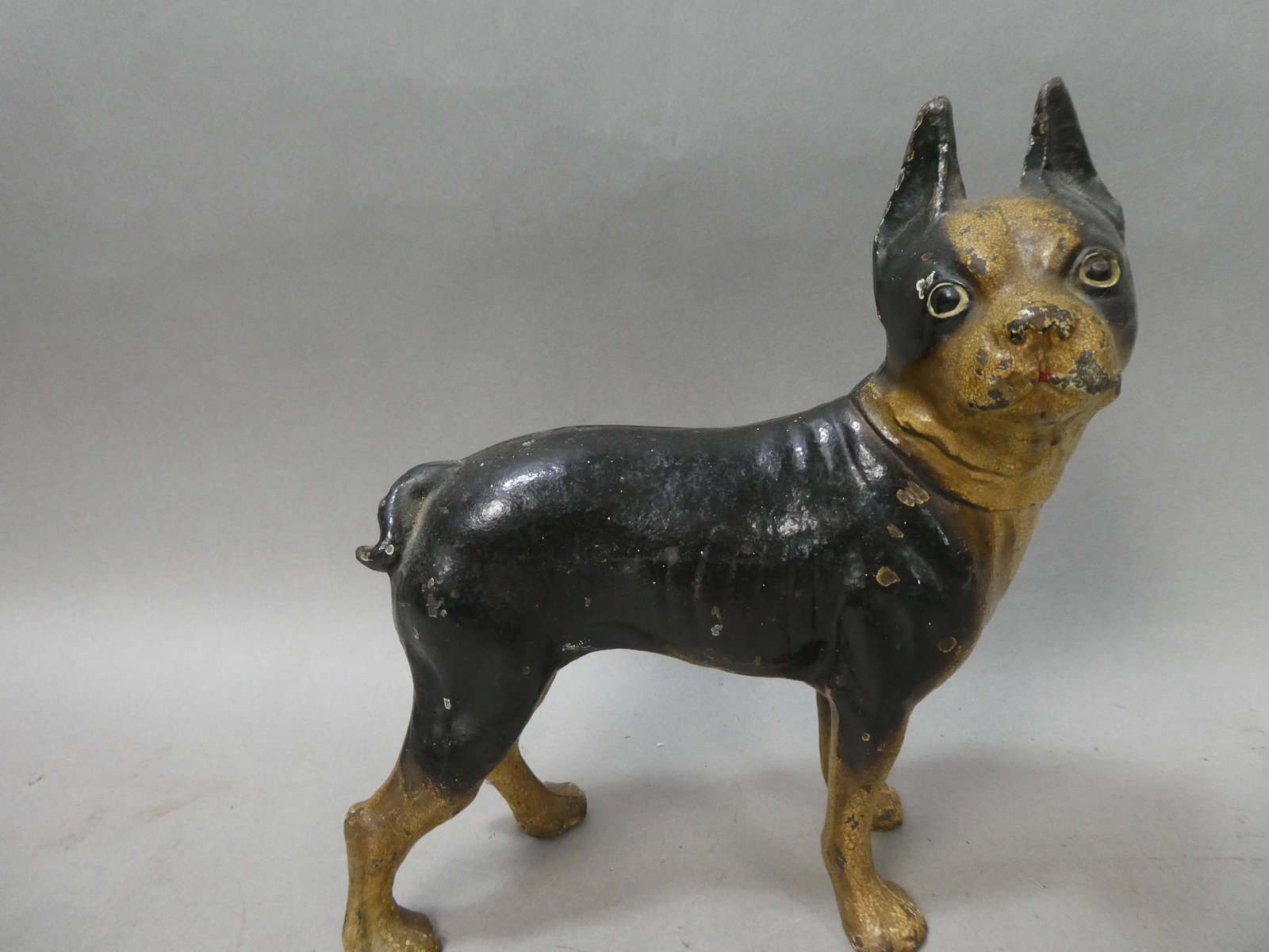 Antique Cast Iron Boston Terrier Door Stop Figurine: Antique Cast Iron Boston Terrier Door Stop Figurine. Measurements in inches: 9 high x 8 long Condition:Some wear to paint Shipping:We offer in-house shipping. Item(s) will be packed after invoice is p