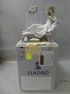 Lladro 7634 Garden of Dreams Figurine in Box Reclining Woman: Lladro 7634 Garden of Dreams Figurine in Box with base and certificate of authenticity. Measurements in inches: 11 high Condition:Good with no chips, cracks or repairs Shipping:We offer in-house shipp