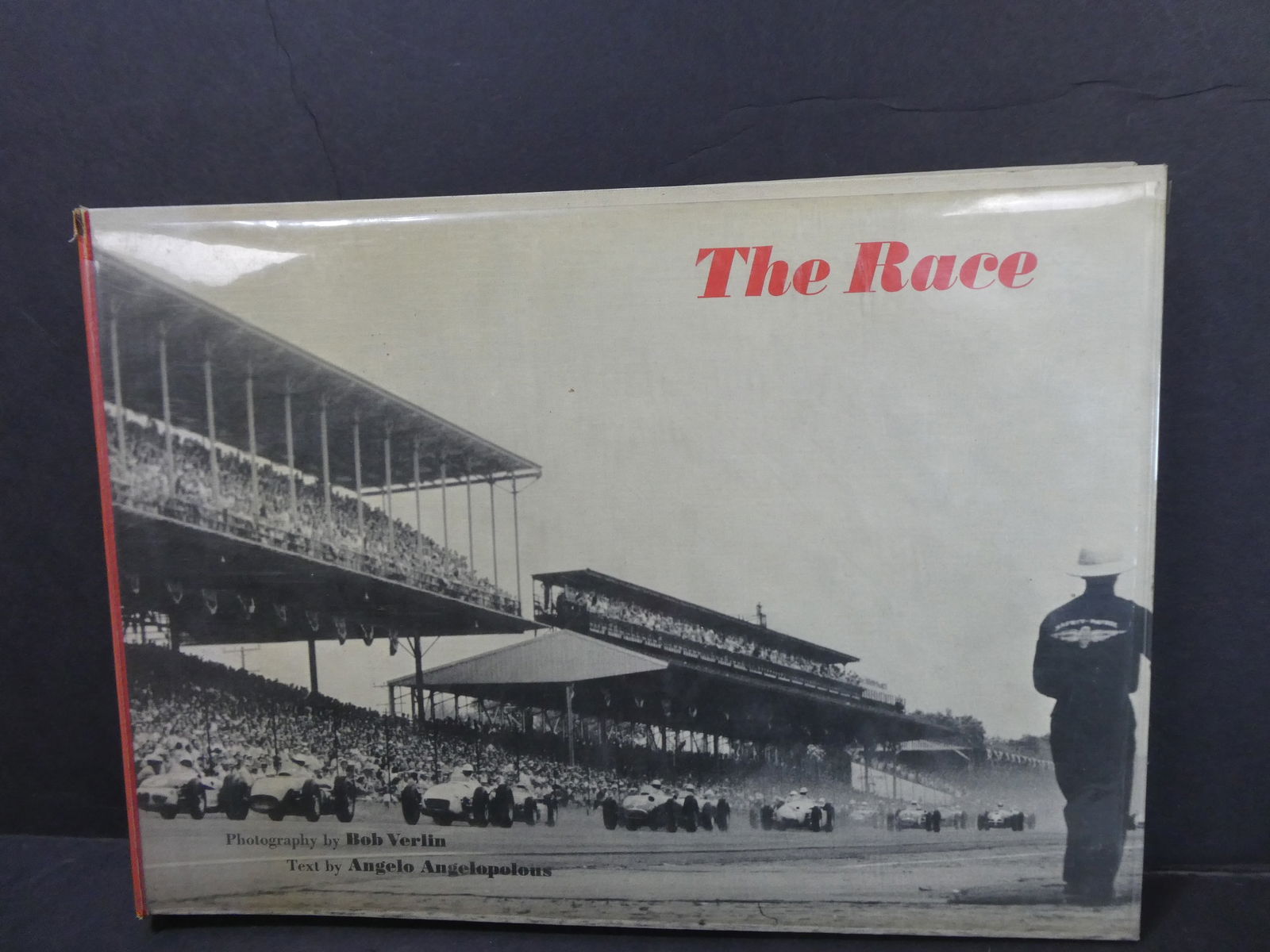1958 Indy 500 The Race Photos by Bob Verlin Angelo Angelopoulos Book: 1958 Indy 500 The Race Photos by Bob Verlin Angelo Angelopoulos Book. Measurements in inches: 8 x 10 Condition:Has toning to cover and edges of pages. Small tear on binding Shipping:We offer in-house