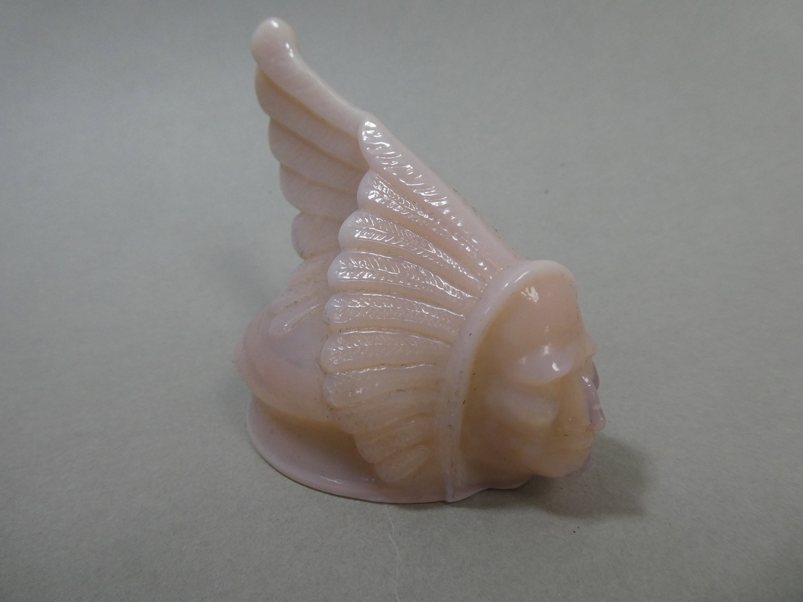 1981 Boyd Pink Glass Pontiac Indian Chief Hood Ornament: 1981 Boyd Pink Glass Pontiac Indian Chief Hood Ornament. Measurements in inches: 3 high x 3 diameter Condition:Good with no chips, cracks or repairs Shipping:We offer in-house shipping. Item(s) will b