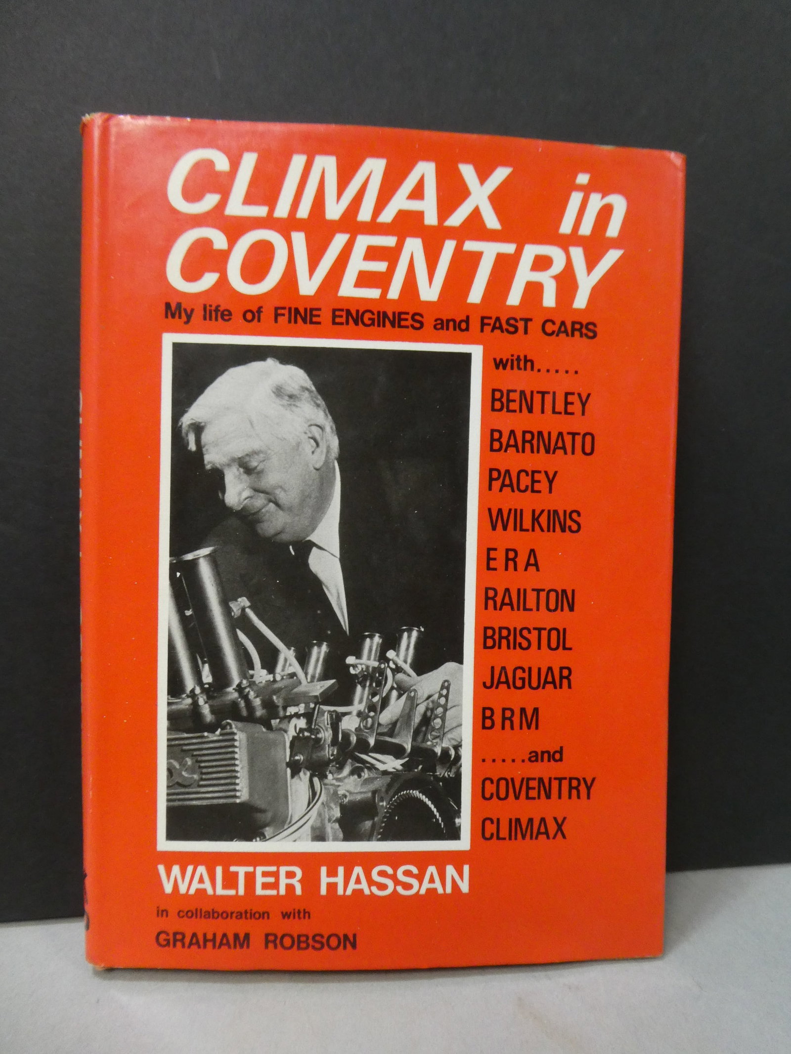 1975 Climax in Coventry Life of Walter Hassan w/ Graham Robson: 1975 Climax in Coventry Life of Walter Hassan w/ Graham Robson. Measurements in inches: 6 1/2 x 9 Condition:Good with no problems Shipping:We offer in-house shipping. Item(s) will be packed after invo
