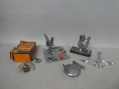 Lot Hood Ornaments & Radiator Caps Hermes Alvis Devil Monogram Box  etc: Lot Hood Ornaments & Radiator Caps including broken Hermes radiator cap, new chrome stick on, Alvis bird on marble base, Devil on marble base and peacock in a Monogram Radiator Ornament box (Both very