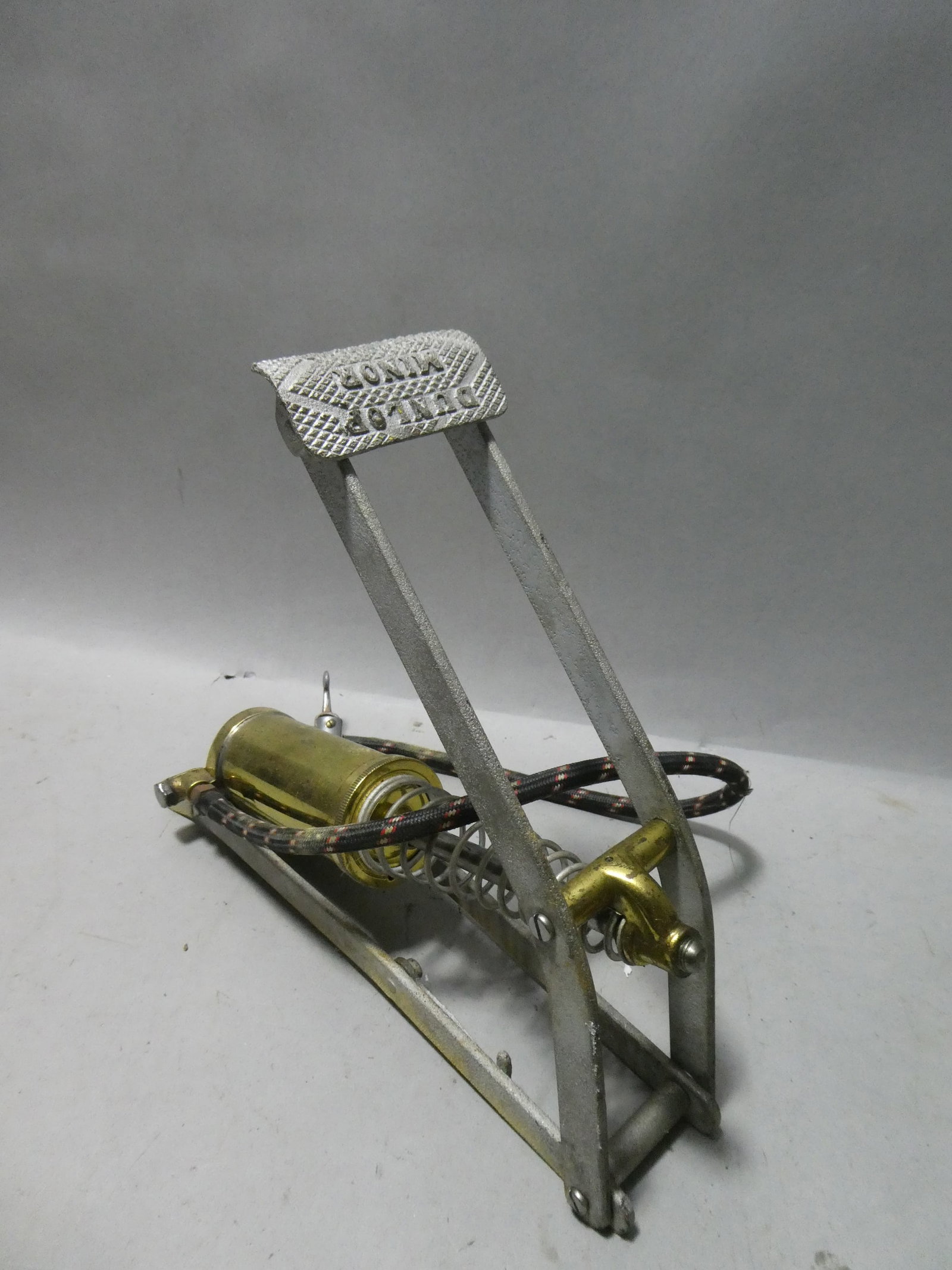 Vintage Dunlop Minor England Air Pump: Vintage Dunlop Minor England Air Pump. Condition:Show some wear with age, works Shipping:We offer in-house shipping. Item(s) will be packed after invoice is paid and shipping charge will be invoiced s