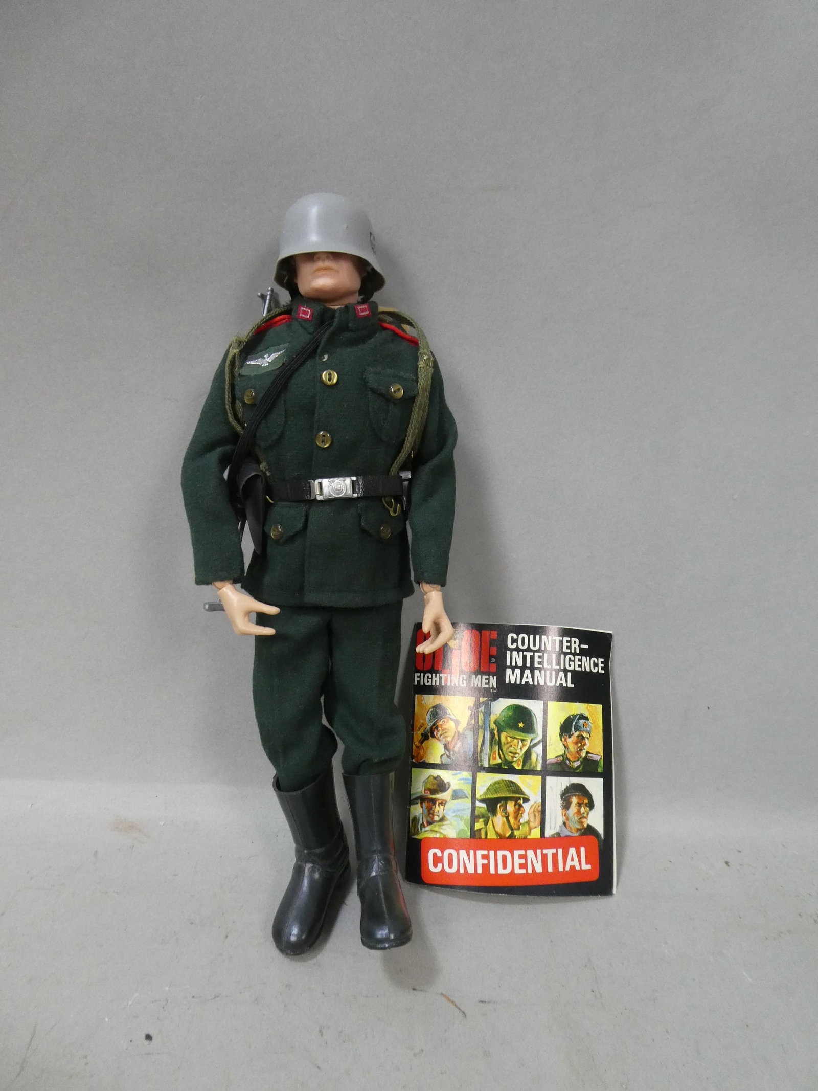 1964 Hasbro GI Joe German Nazi Soldier 12" Action Figure: 1964 Hasbro GI Joe German Nazi Soldier 12" Action Figure. Measurements in inches: 12 high Condition:Missing Iron Cross medal Shipping:We offer in-house shipping. Item(s) will be packed after invoice i