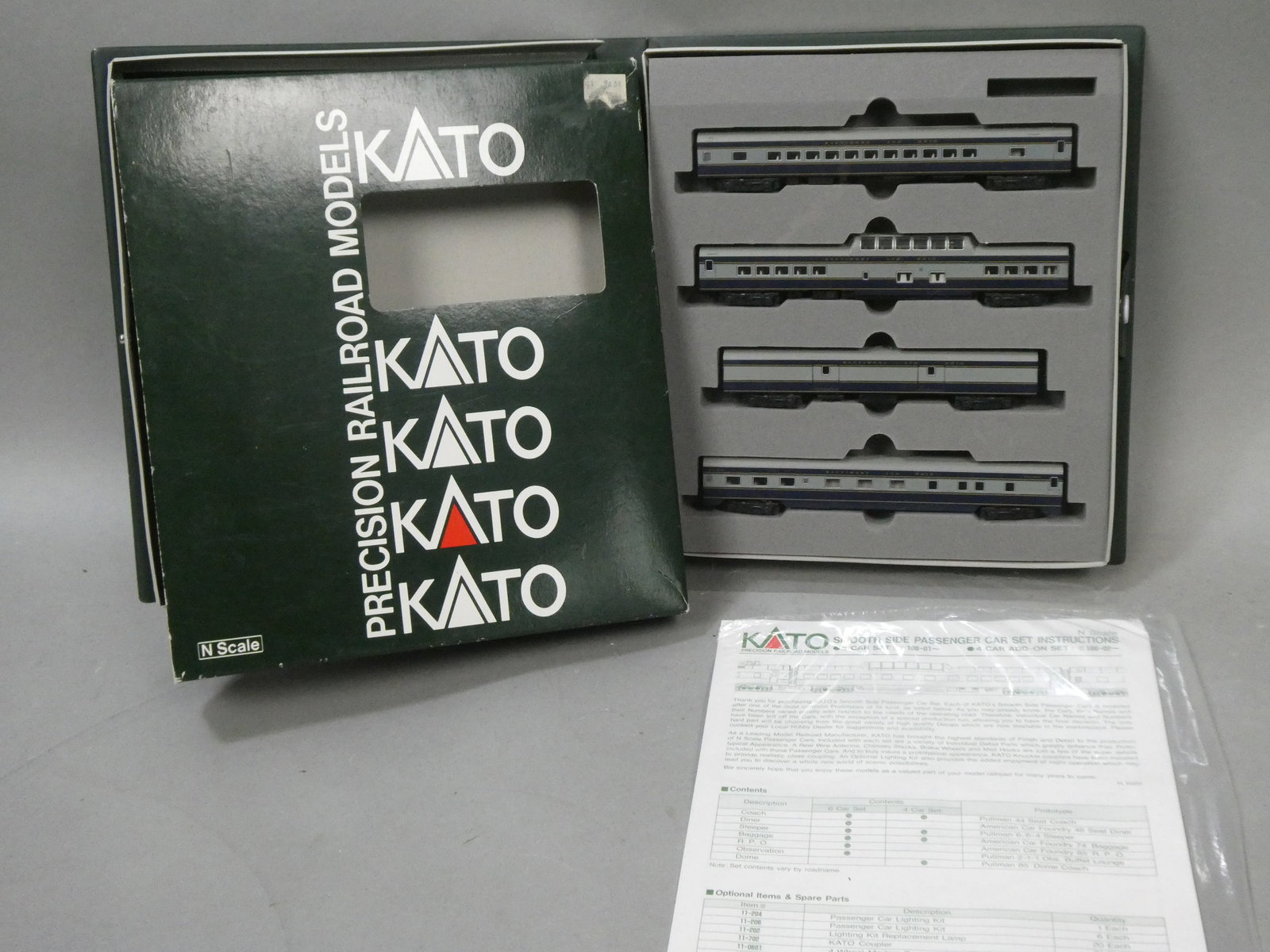 Kato N Scale 106-026 B&I Smooth Side Passenger 4 Car Set in Box: Kato N Scale 106-026 B&I Smooth Side Passenger 4 Car Set in Box. Condition:Looks little if ever used Shipping:We offer in-house shipping. Item(s) will be packed after invoice is paid and shipping char