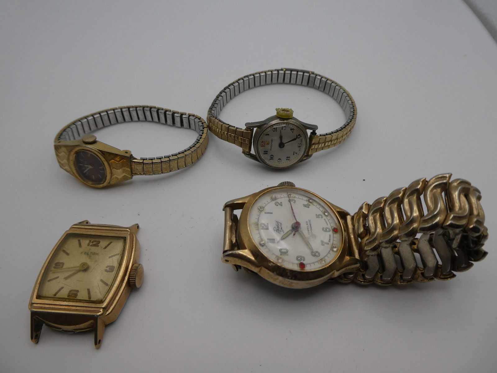 Lot 4 Watches Bulova Kelton Passport & Rare Rasis Sport: Lot 4 Watches Bulova Kelton Passport & Rare Rasis Sport. Condition:As found sold as is Shipping:We offer in-house shipping. Item(s) will be packed after invoice is paid and shipping charge will be inv