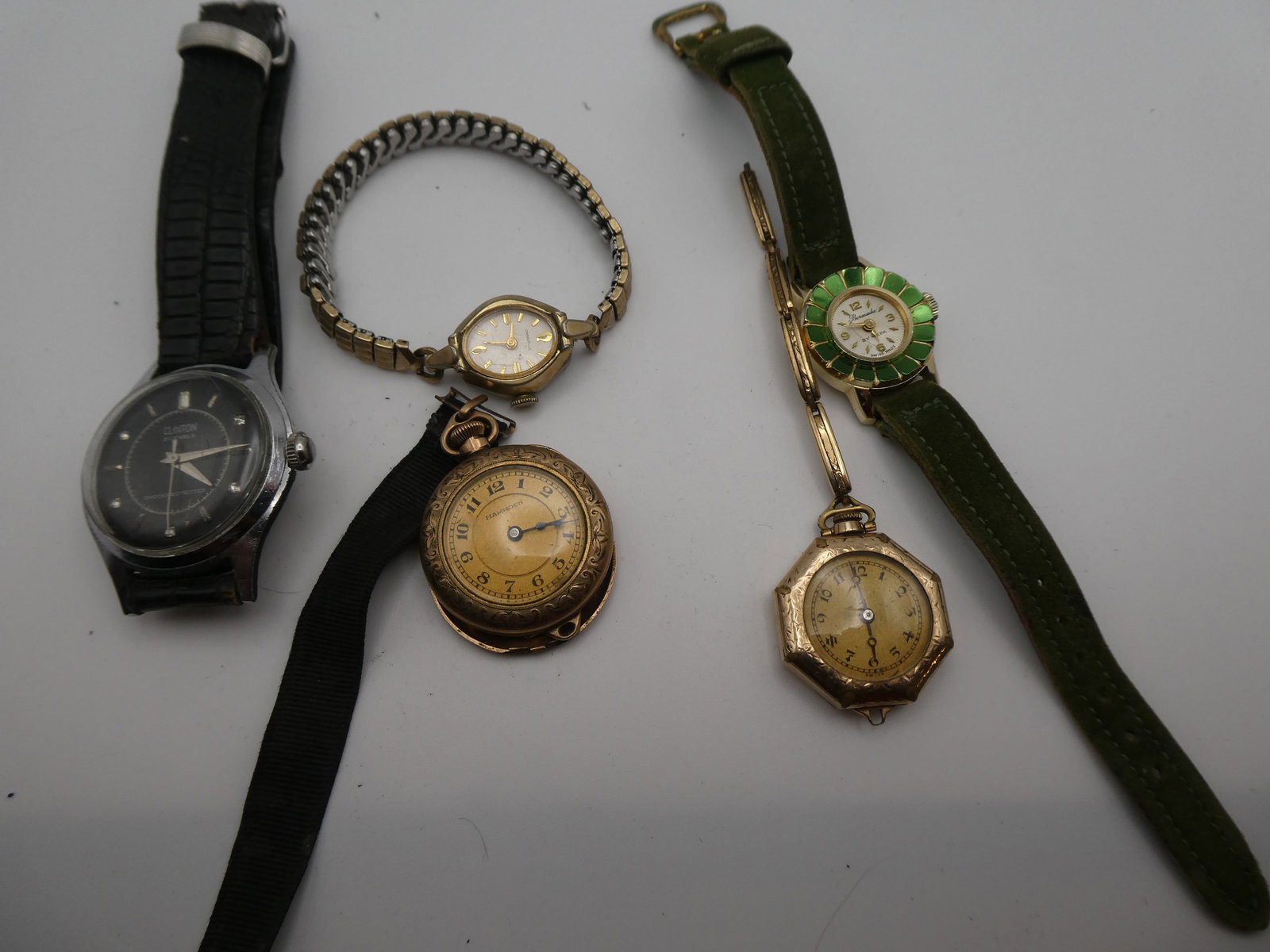 Lot 5 Watches Bermuda Le Coultre Hampsen Caravelle & Clinton: Lot 5 Watches Bermuda Le Coultre Hampsen Caravelle & Clinton. Condition:As found sold as is Shipping:We offer in-house shipping. Item(s) will be packed after invoice is paid and shipping charge will b