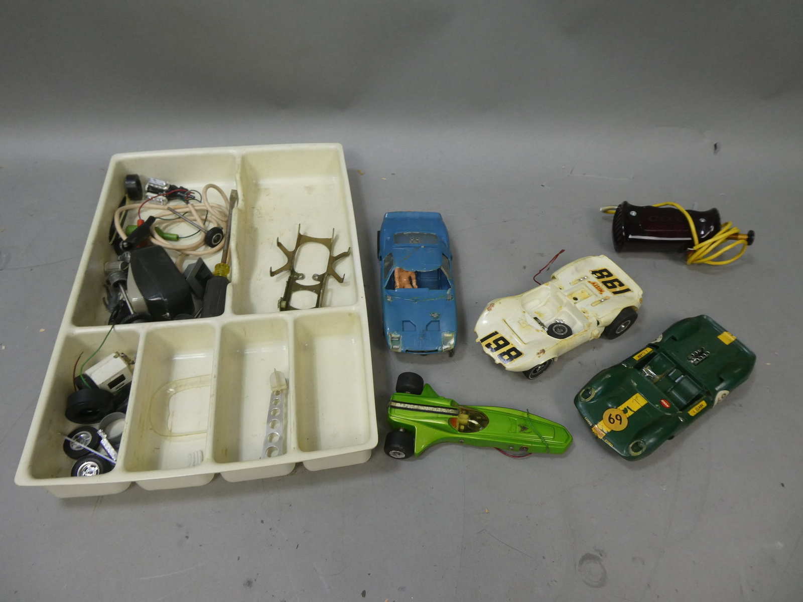 Lot 1/24 Cox Slot Car Racecars & Parts Lotus Chapparal etc: Lot 1/24 Cox Slot Car Racecars & Parts Lotus Chapparal etc. Condition:As found, sold as is Shipping:We offer in-house shipping. Item(s) will be packed after invoice is paid and shipping charge will be