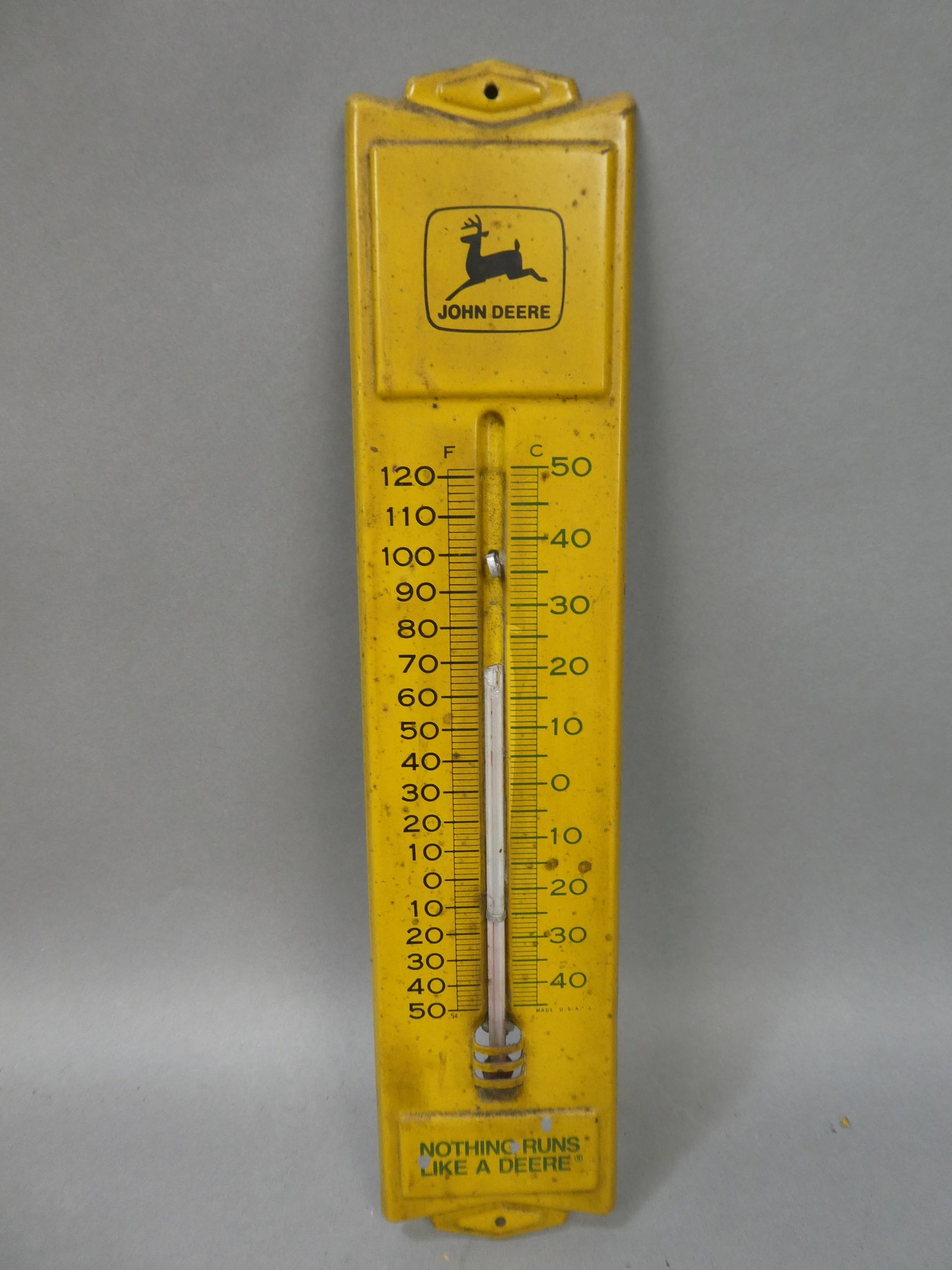 Vintage John Deere Tractor Advertising Thermometer: Vintage John Deere Tractor Advertising Thermometer. Nothing runs like a Deere. Measurements in inches: 12 1/2 long Condition:Has broken thermometer. General wear Shipping:We offer in-house shipping. I
