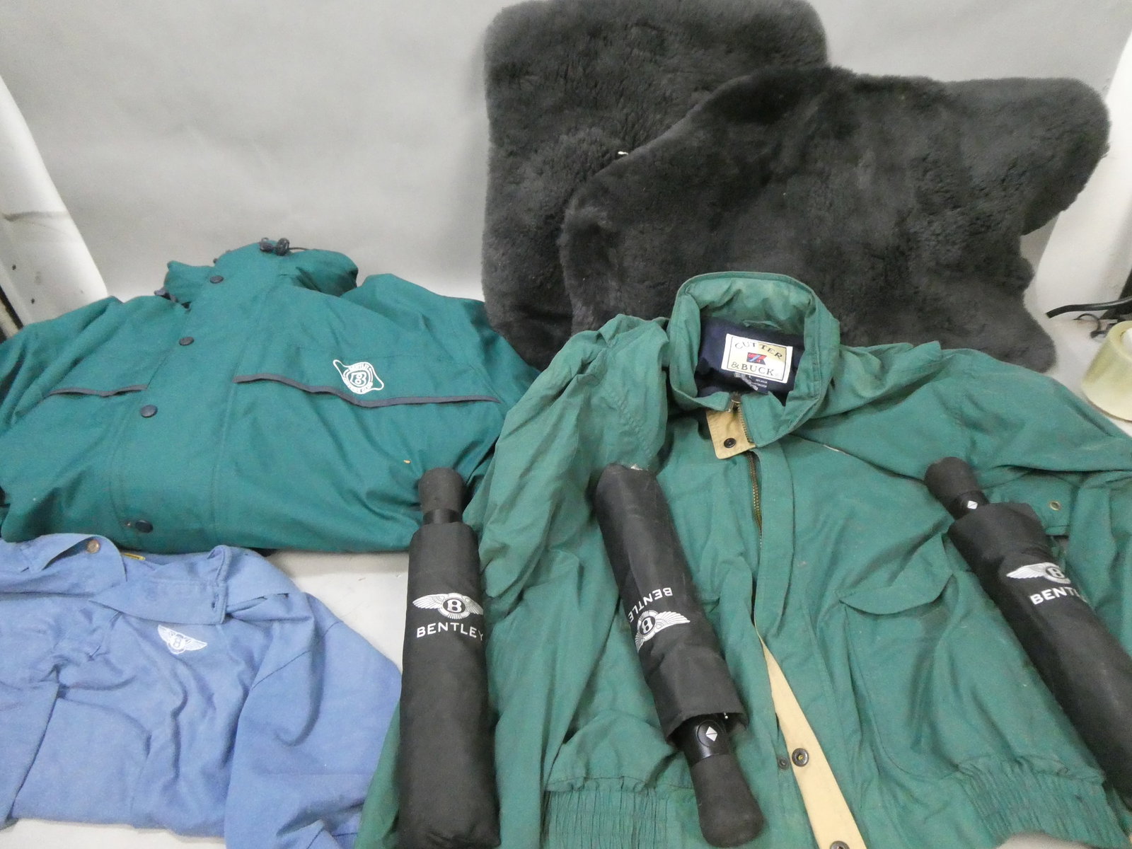 Lot Bentley Items Umbrella, Shirt Jackets Lambskin Rugs: Lot Bentley Items Umbrella, Shirt Jackets Lambskin Rugs. Condition:As found, all needs a good cleaning Shipping:We offer in-house shipping. Item(s) will be packed after invoice is paid and shipping ch