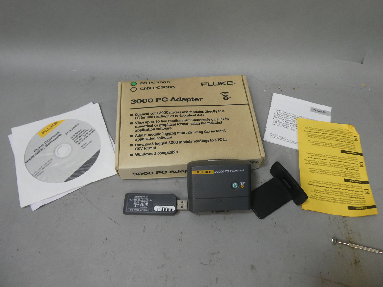 Fluke FC PC3000 PC Adapter w/ IR3000 FE Connector: Fluke FC PC3000 PC Adapter w/ IR3000 FE Connector This item is from a Gurnee, IL private estate. The estate included lots of cameras and accessories, motorcycles and parts, vehicles, knives, guns, too