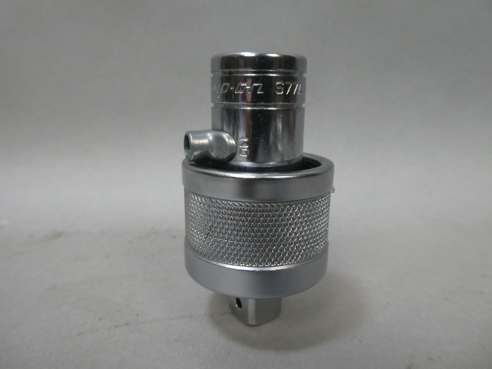 Genuine Snap-On Tools 1/2 Drive S77A Ratchet Adaptor: Genuine Snap-On Tools 1/2 Drive S77A Ratchet Adaptor This item is from a Gurnee, IL private estate. The estate included lots of cameras and accessories, motorcycles and parts, vehicles, knives, guns,