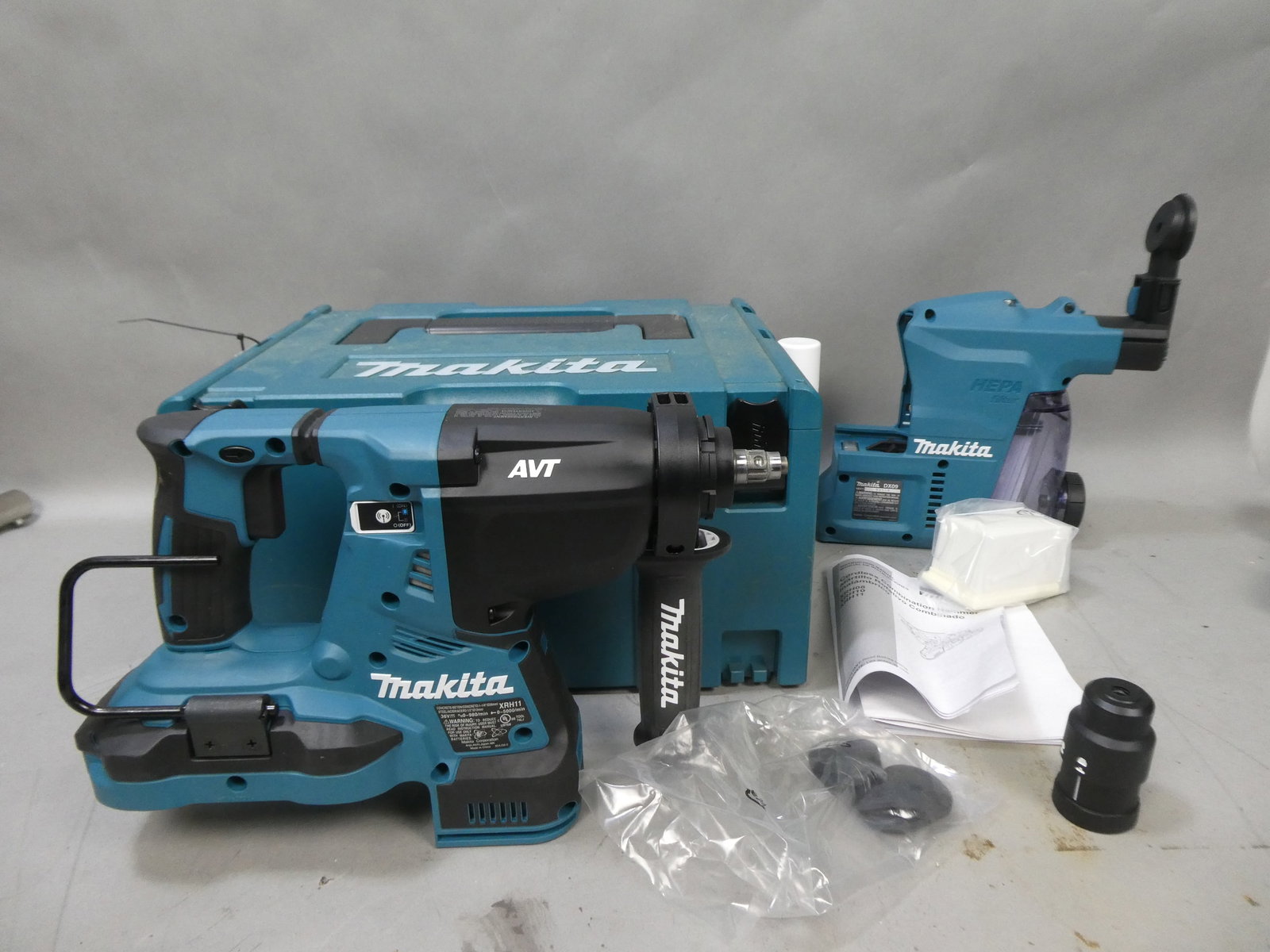 Makita XRH11 Cordless Rotary Hammer DX09 Dust Collector 197212-5 Interlocking Case & More: Makita XRH11 Cordless Rotary Hammer DX09 Dust Collector 197212-5 Interlocking Case & More This item is from a Gurnee, IL private estate. The estate included lots of cameras and accessories, motorcycle