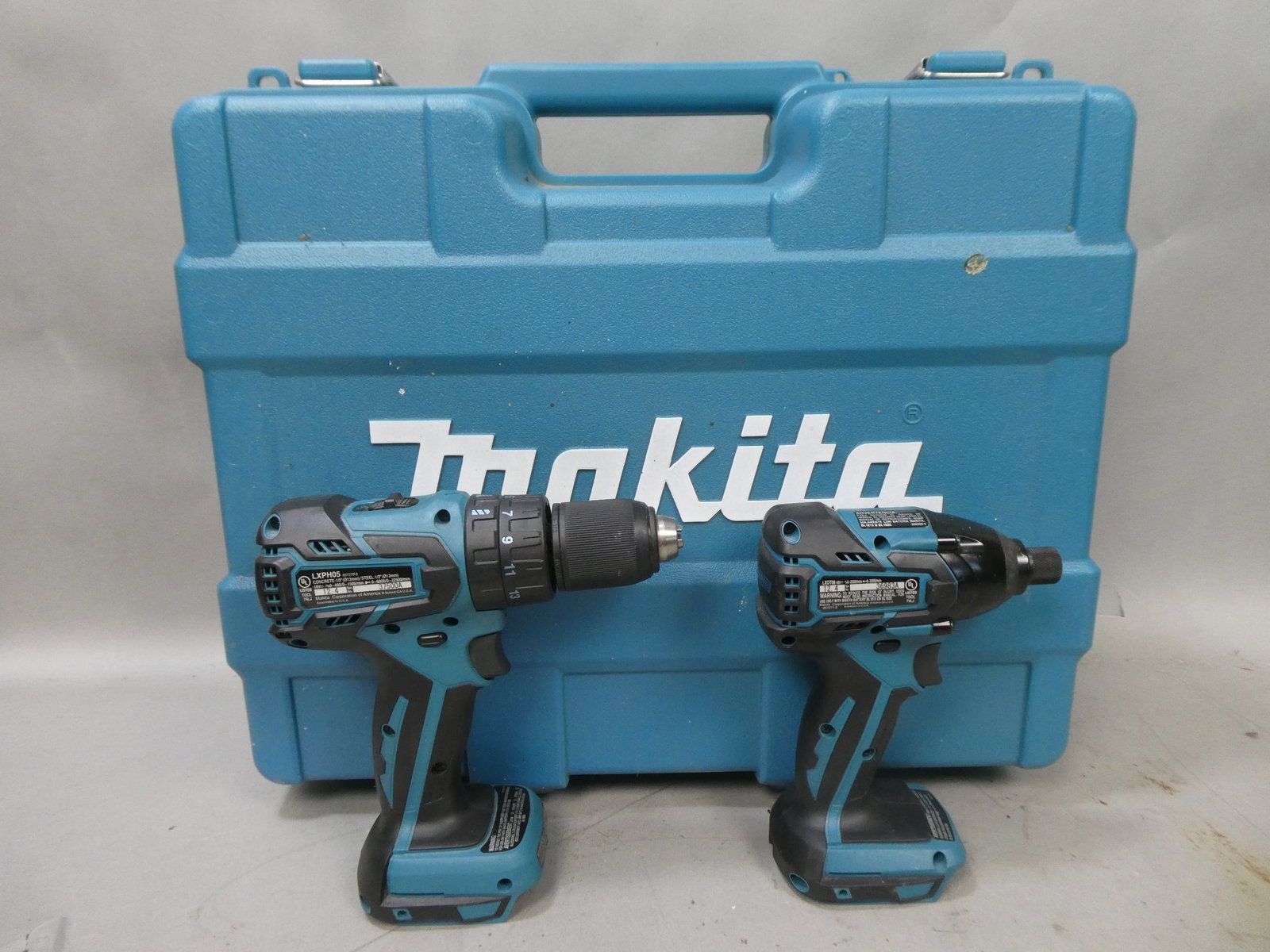 Makita Cordless Drill Driver LXDT08 & LXPH05 w/ Case: Makita Cordless Drill Driver LXDT08 & LXPH05 w/ Case This item is from a Gurnee, IL private estate. The estate included lots of cameras and accessories, motorcycles and parts, vehicles, knives, guns, 