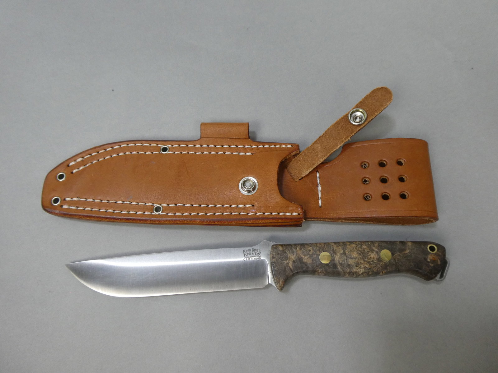 Bark River Bravo-1 CMP S35VN Knife w/ Leather Sheath: Bark River Bravo-1 CMP S35VN Knife with Bark River Leather Sheath This item is from a Gurnee, IL private estate. The estate included lots of cameras and accessories, motorcycles and parts, vehicles, k