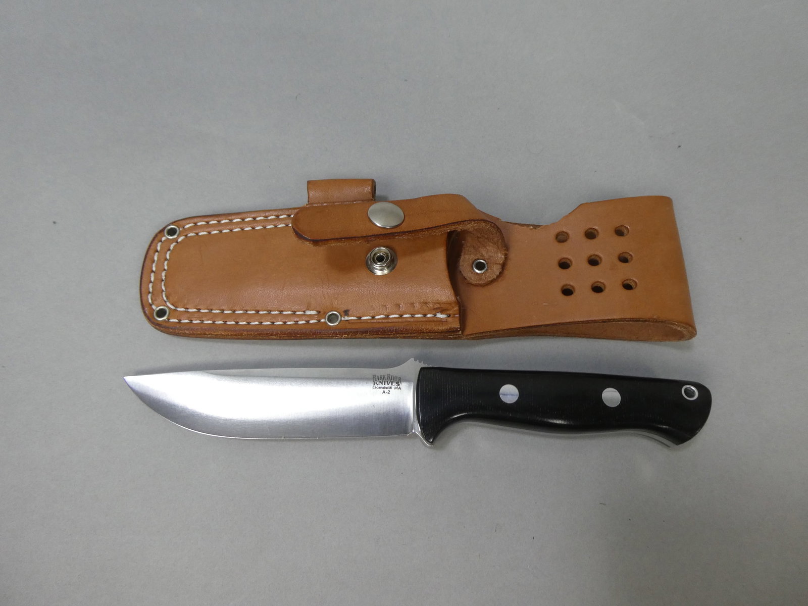 Bark River A-2 Knife w/ Leather Sheath: Bark River A-2 Knife with Bark River Leather Sheath This item is from a Gurnee, IL private estate. The estate included lots of cameras and accessories, motorcycles and parts, vehicles, knives, guns, t