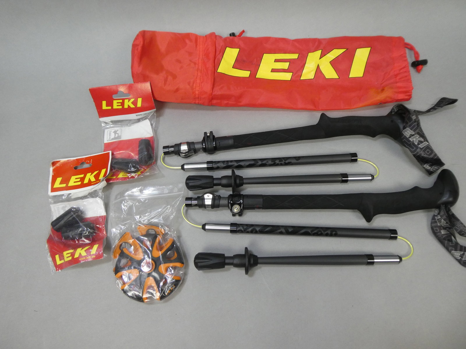 Pair Leki Collapsible Trekking Hiking Poles: Pair Leki Collapsible Trekking Hiking Poles in bag with two extra sets of end caps This item is from a Gurnee, IL private estate. The estate included lots of cameras and accessories, motorcycles and p