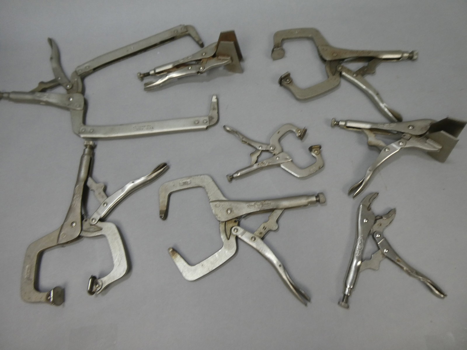 Lot 8 Assorted Welding Vise Grips: Lot 8 Assorted Welding Vise Grips This item is from a Gurnee, IL private estate. The estate included lots of cameras and accessories, motorcycles and parts, vehicles, knives, guns, tools, workshop equ