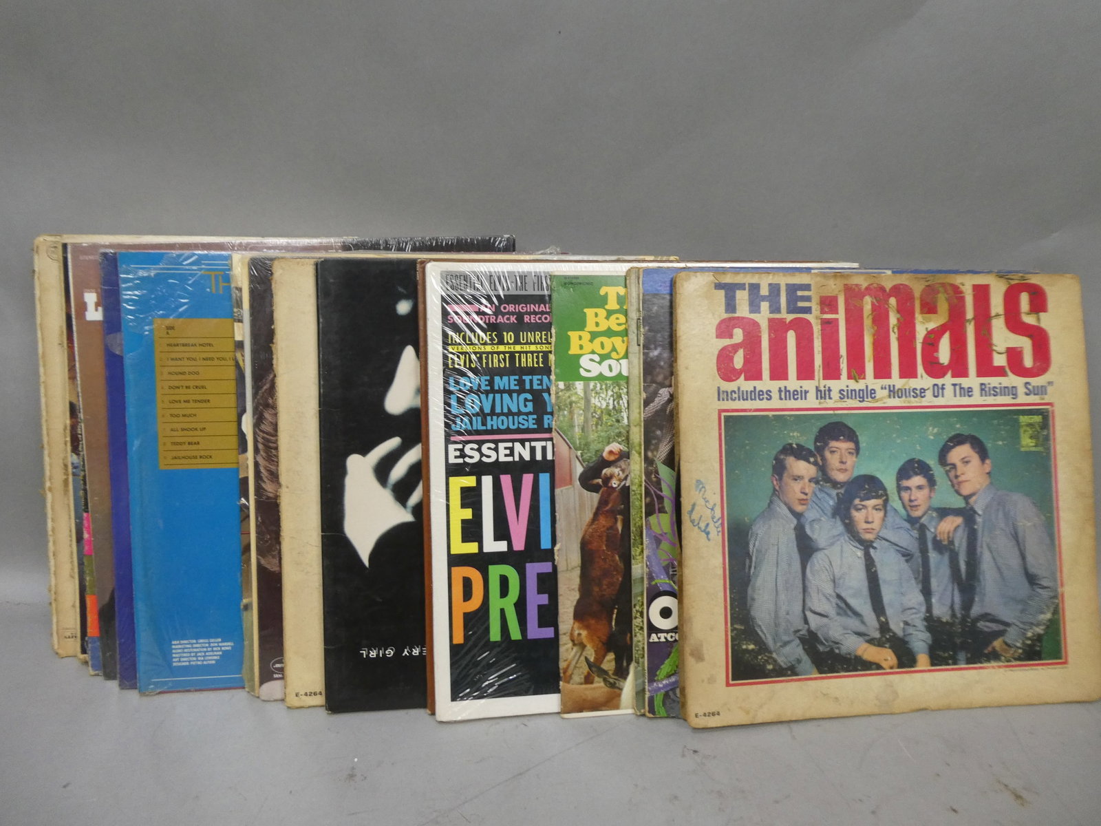 Lot 22 c1960's Assorted LP Record Vinyl Albums Animals Beatles etc: Lot 22 c1960's Assorted LP Record Vinyl Albums including Beatles, Animals, Elvis, Bee Gees, Harry Lee Lewis, Roy Orbison, Ventures, Beach Boys, Paul Revere and Little Richard. Condition:As found, Slee