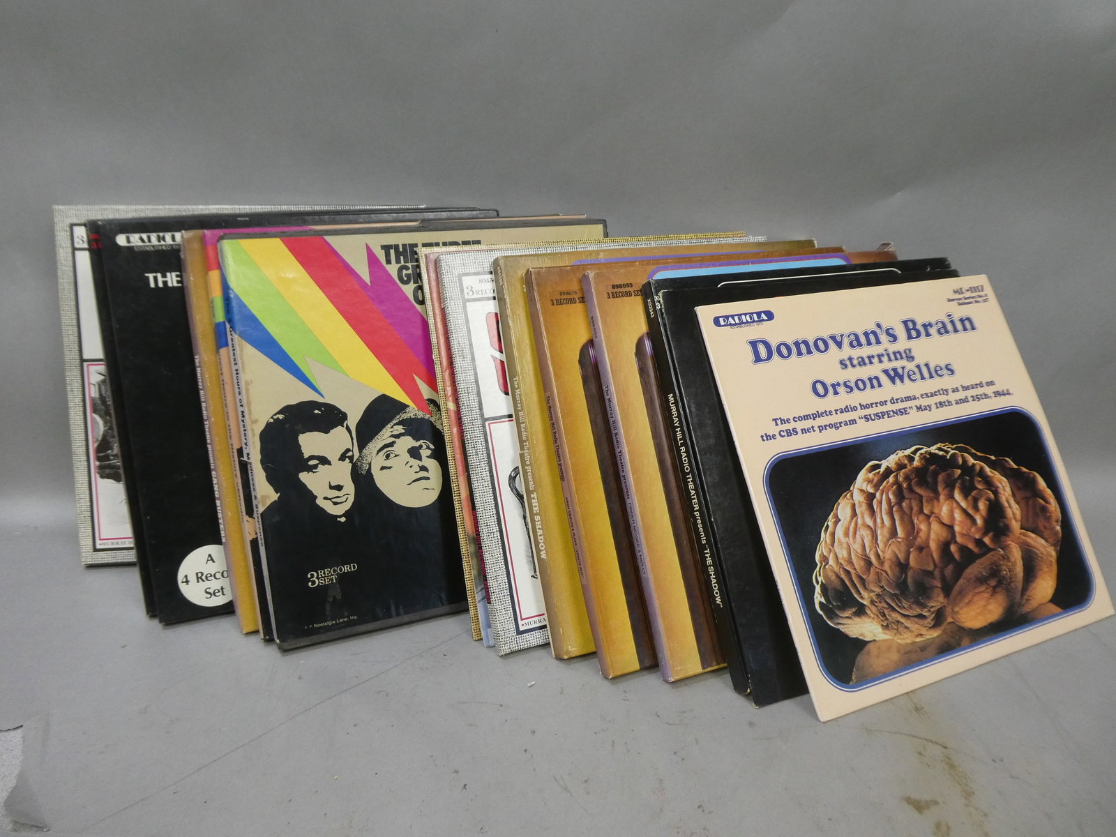 Lot 16 Radio Serials Assorted LP Record Vinyl Albums: Lot 16 Radio Serials Assorted LP Record Vinyl Albums including the Shadow, Sherlock Holmes, Orson Wells, Greatest Mysteries, Murray Hill Radio Theatre and Martian Chronicles. Condition:Minor wear to c