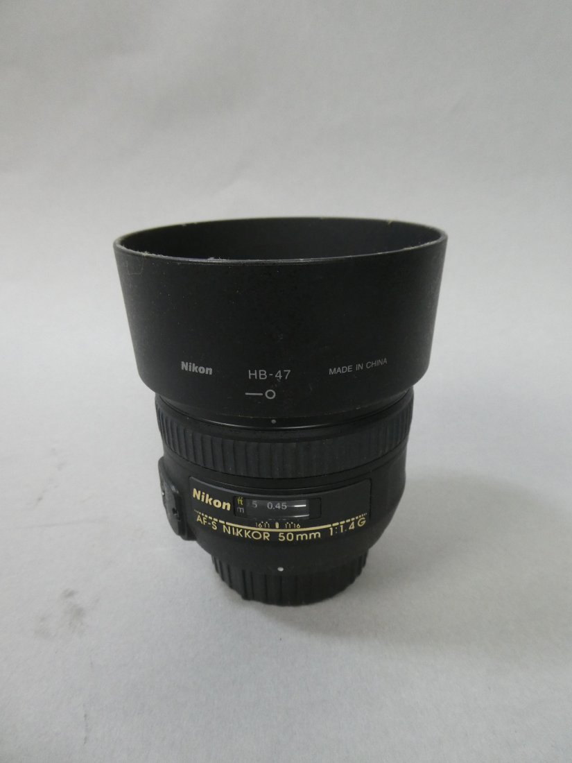 Nikon Nikkor AF-S 50mm 1:1.4 G Lens w/ HB-47 Hood: Nikon Nikkor AF-S 50mm 1:1.4 G Lens w/ HB-47 Hood This item is from a Gurnee, IL private estate. The estate included lots of cameras and accessories, motorcycles and parts, vehicles, knives, guns, too