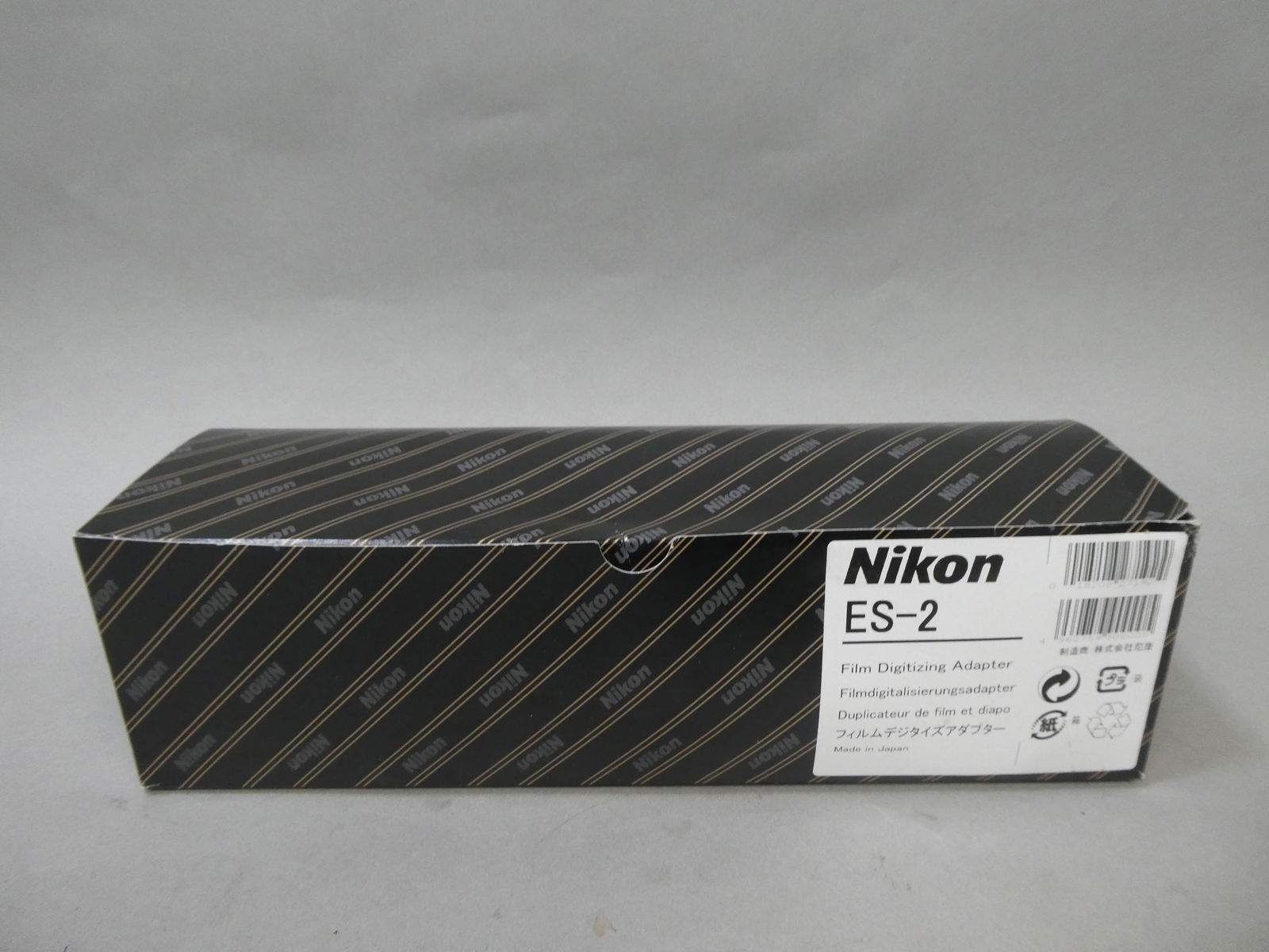 New in Box Nikon ES-2 Film Digitizing Adaptor: Nikon ES-2 Film Digitizing Adaptor This item is from a Gurnee, IL private estate. The estate included lots of cameras and accessories, motorcycles and parts, vehicles, knives, guns, tools, workshop eq