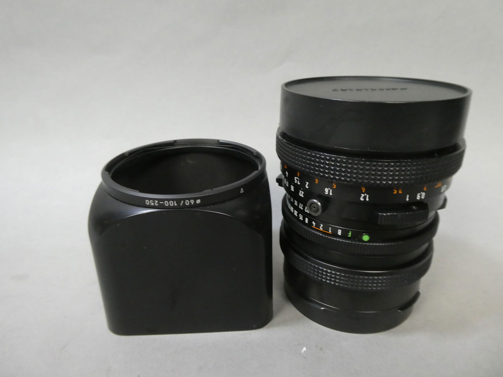 Hasselblad Carl Zeiss T* Distagon 50mm f4 Cfi Medium Format Lens: Hasselblad Carl Zeiss T* Distagon 50mm f4 Cfi Medium Format Lens with 60/100-250 Hasselblad hood This item is from a Gurnee, IL private estate. The estate included lots of cameras and accessories, mot