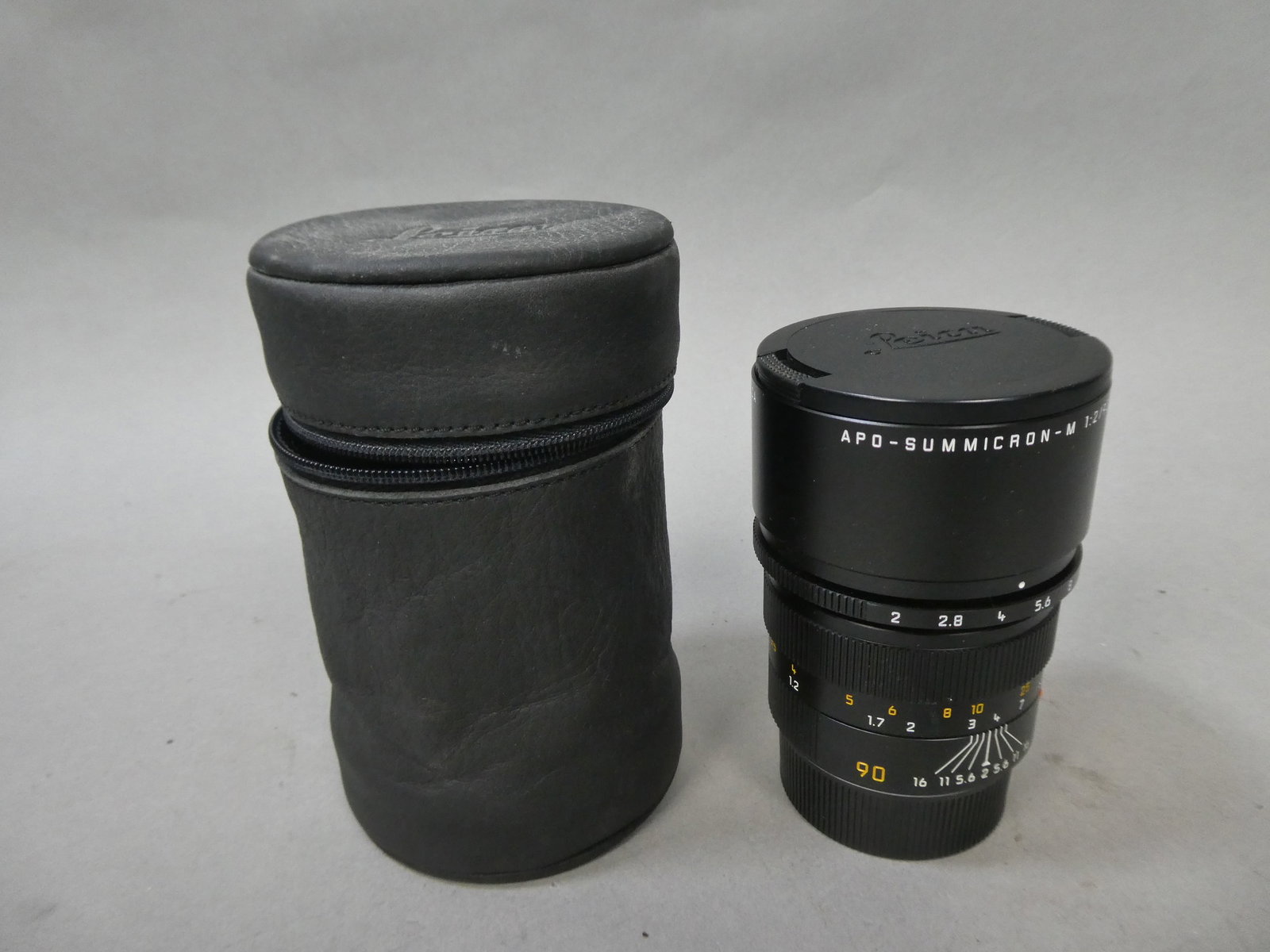 Leica APO-Summicron-M 1:2/90mm ASPH Lens in Case: Leica APO-Summicron-M 1:2/90mm ASPH Lens in Case This item is from a Gurnee, IL private estate. The estate included lots of cameras and accessories, motorcycles and parts, vehicles, knives, guns, tool