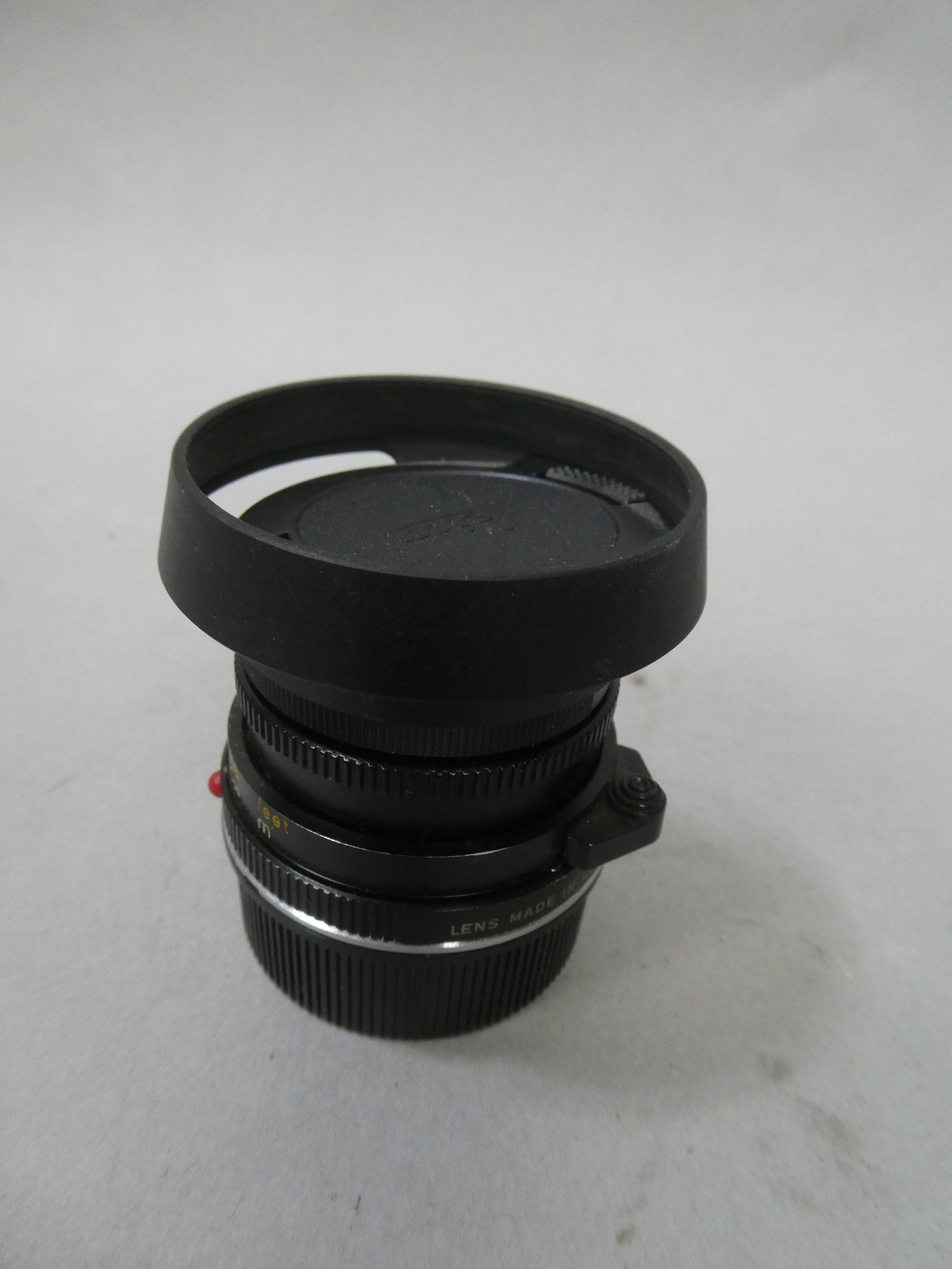 Leica Wetzlar Summicron-C 1:2/40mm Lens: Leica Wetzlar Summicron-C 1:2/40mm Lens This item is from a Gurnee, IL private estate. The estate included lots of cameras and accessories, motorcycles and parts, vehicles, knives, guns, tools, worksh